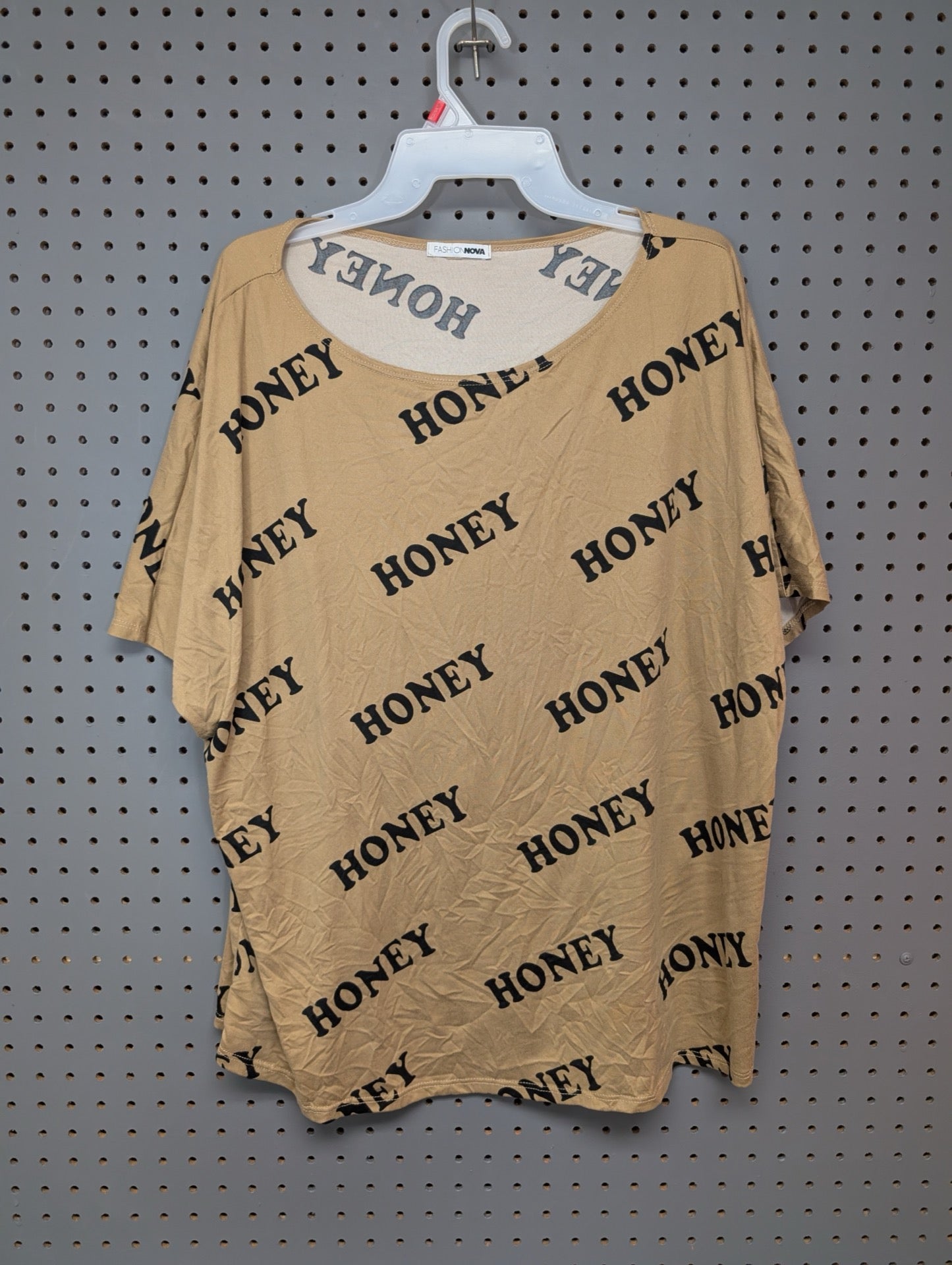 Front of tan Fashion Nova t-shirt with Honey print