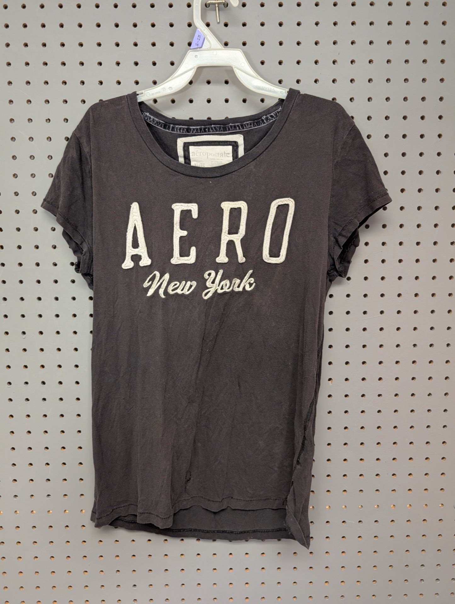 Front of faded black Aeropostale t-shirt with applique logo