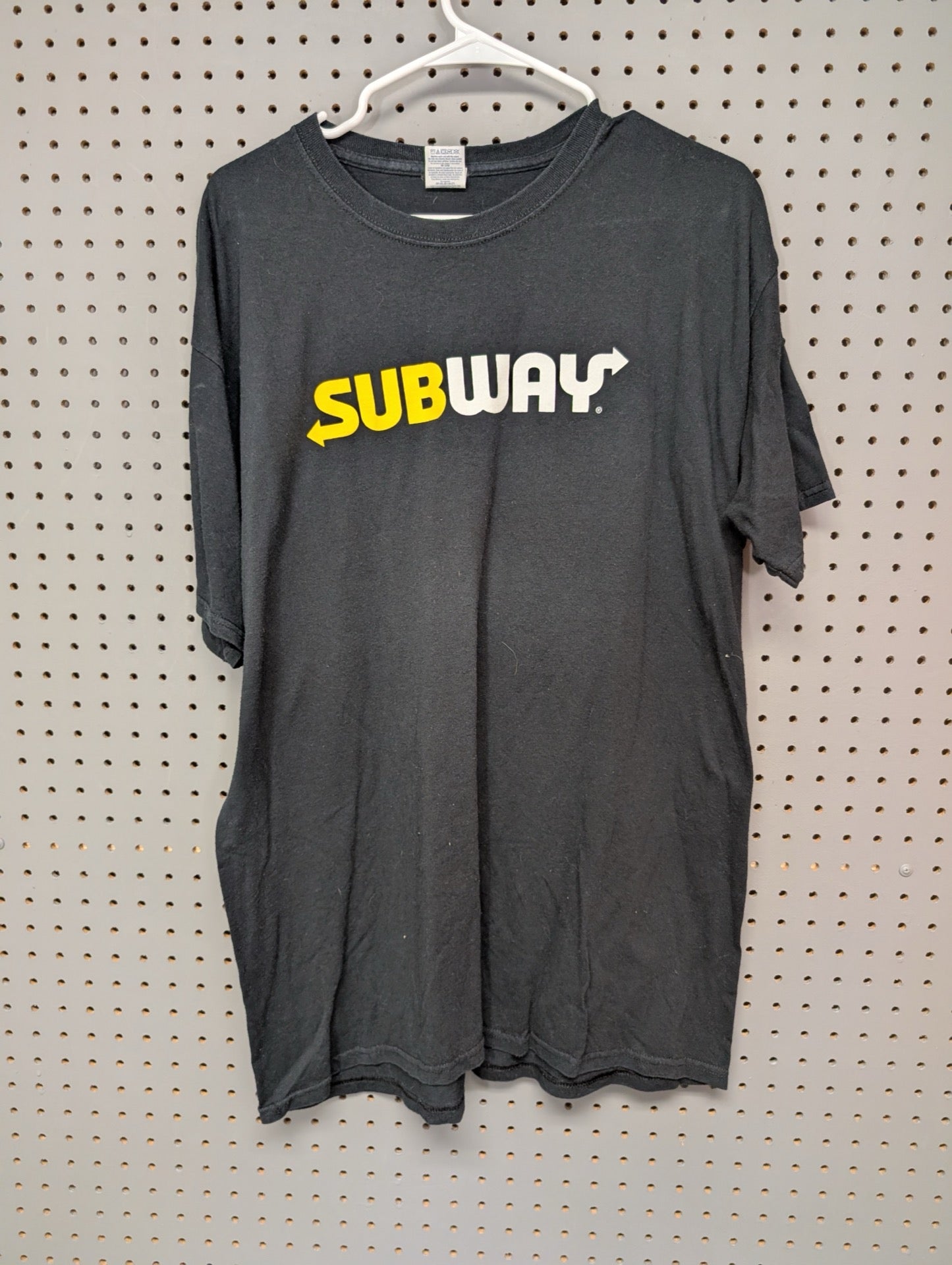 Front view of black Subway employee t-shirt