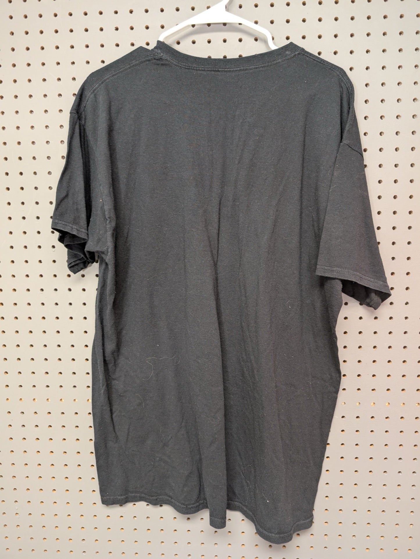 Back view of black Subway employee t-shirt