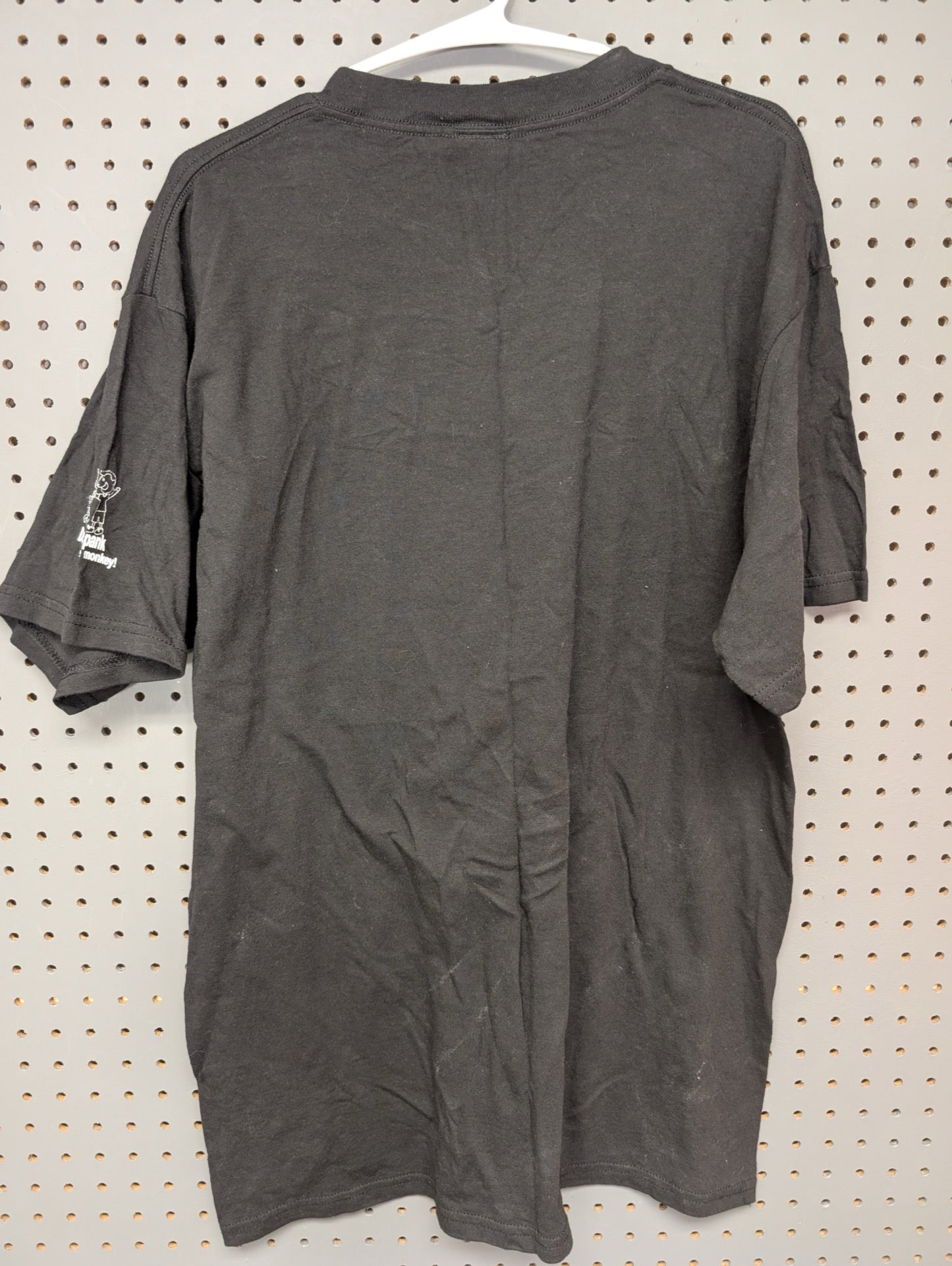Back view of faded black vintage t-shirt