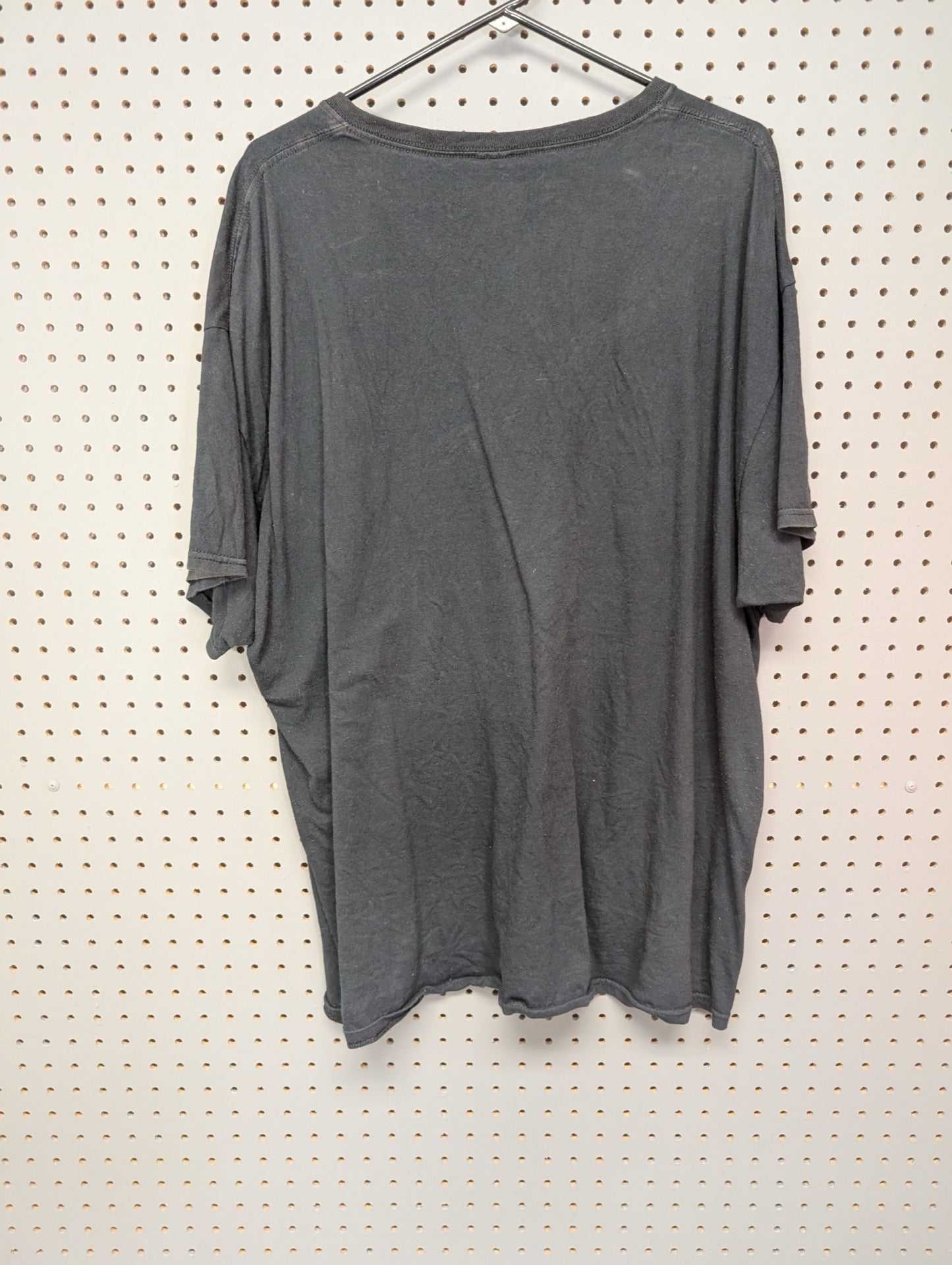 Back view of black DXM streetwear t-shirt
