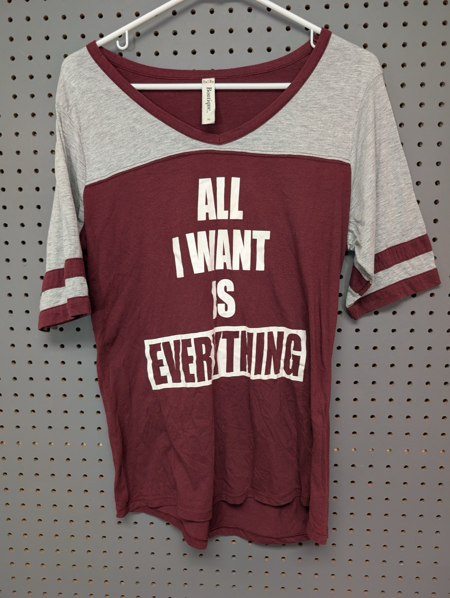 Front view of maroon and grey B&B Boutique slogan t-shirt
