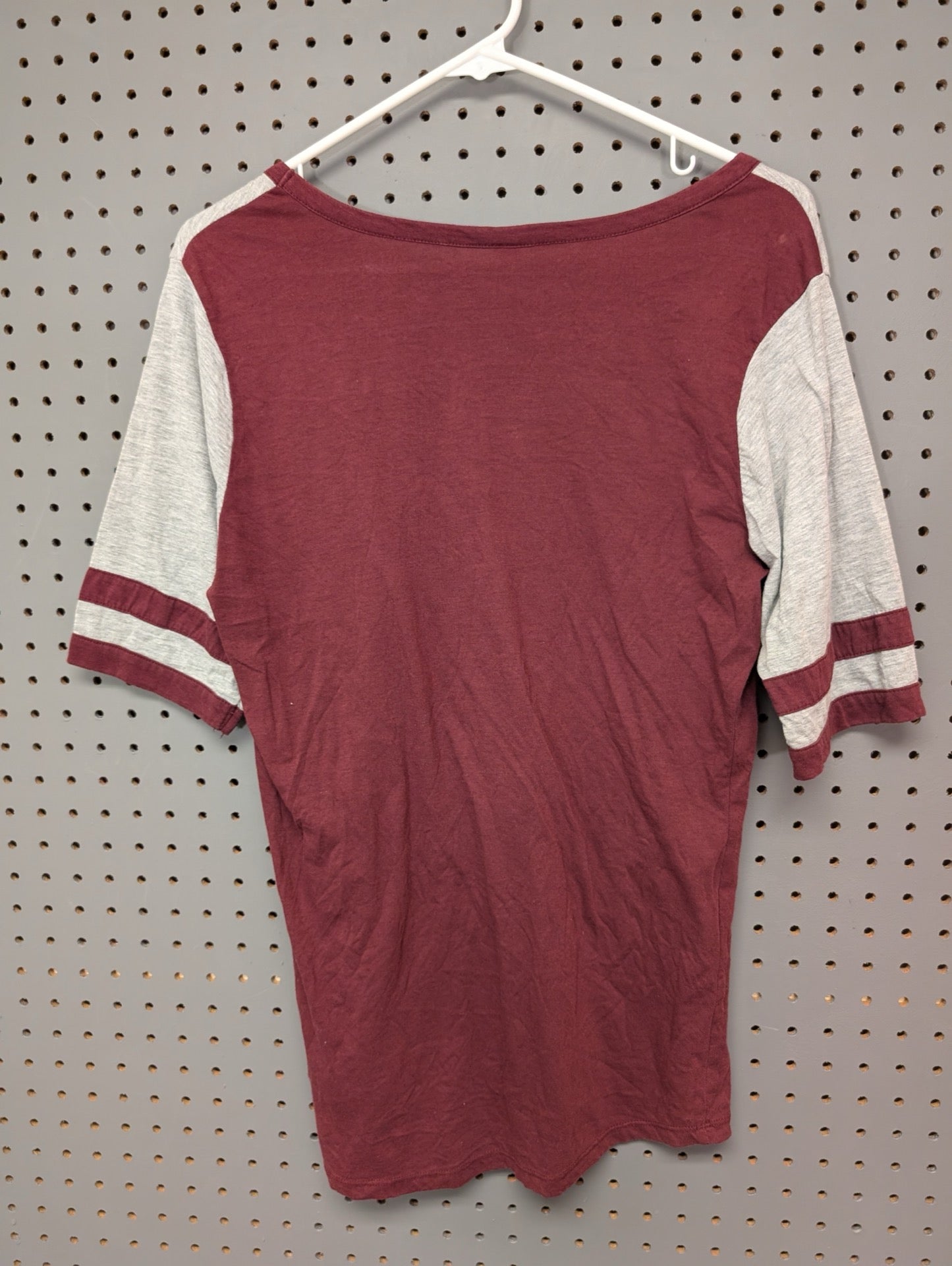 Back view of maroon and grey colorblock t-shirt