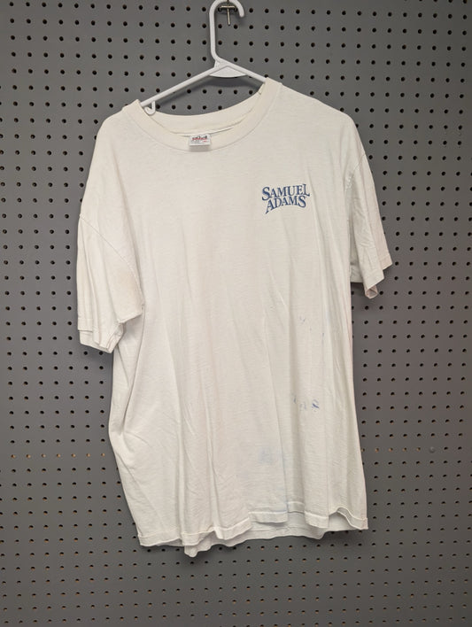 Front view of white Samuel Adams t-shirt showing blue stains