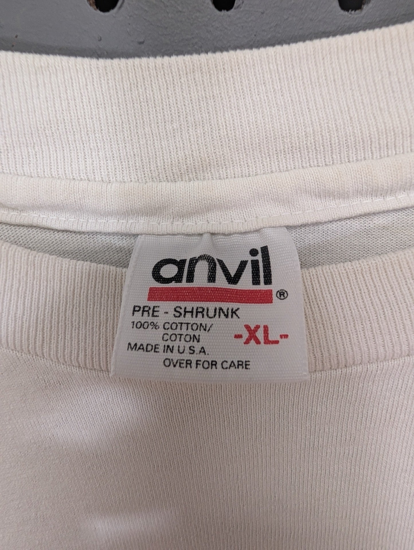 Close up of vintage Anvil USA size XL tag