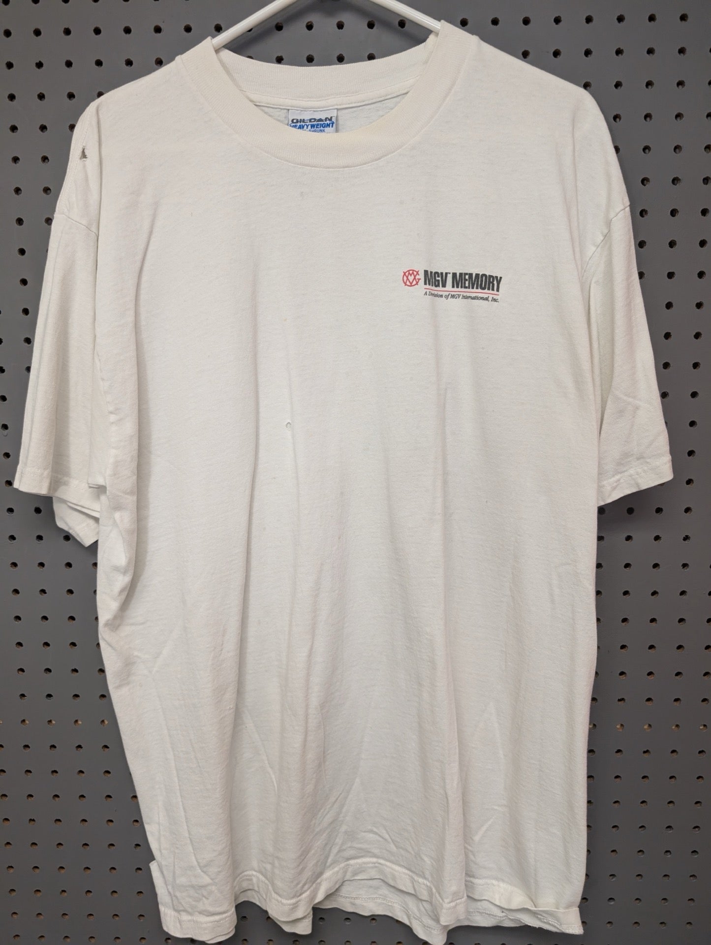 Front view of white MGV Memory t-shirt showing small hole