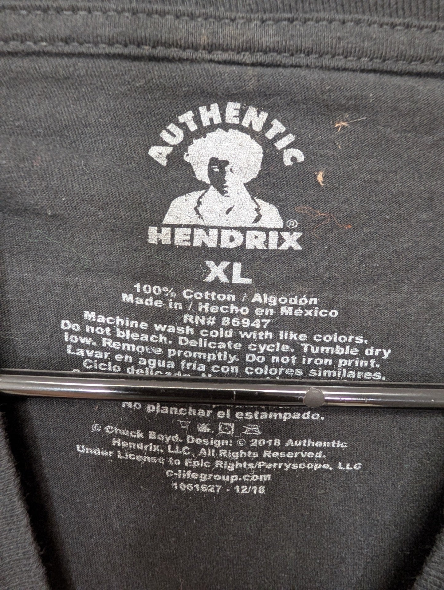 Close up of Authentic Hendrix size XL printed tag