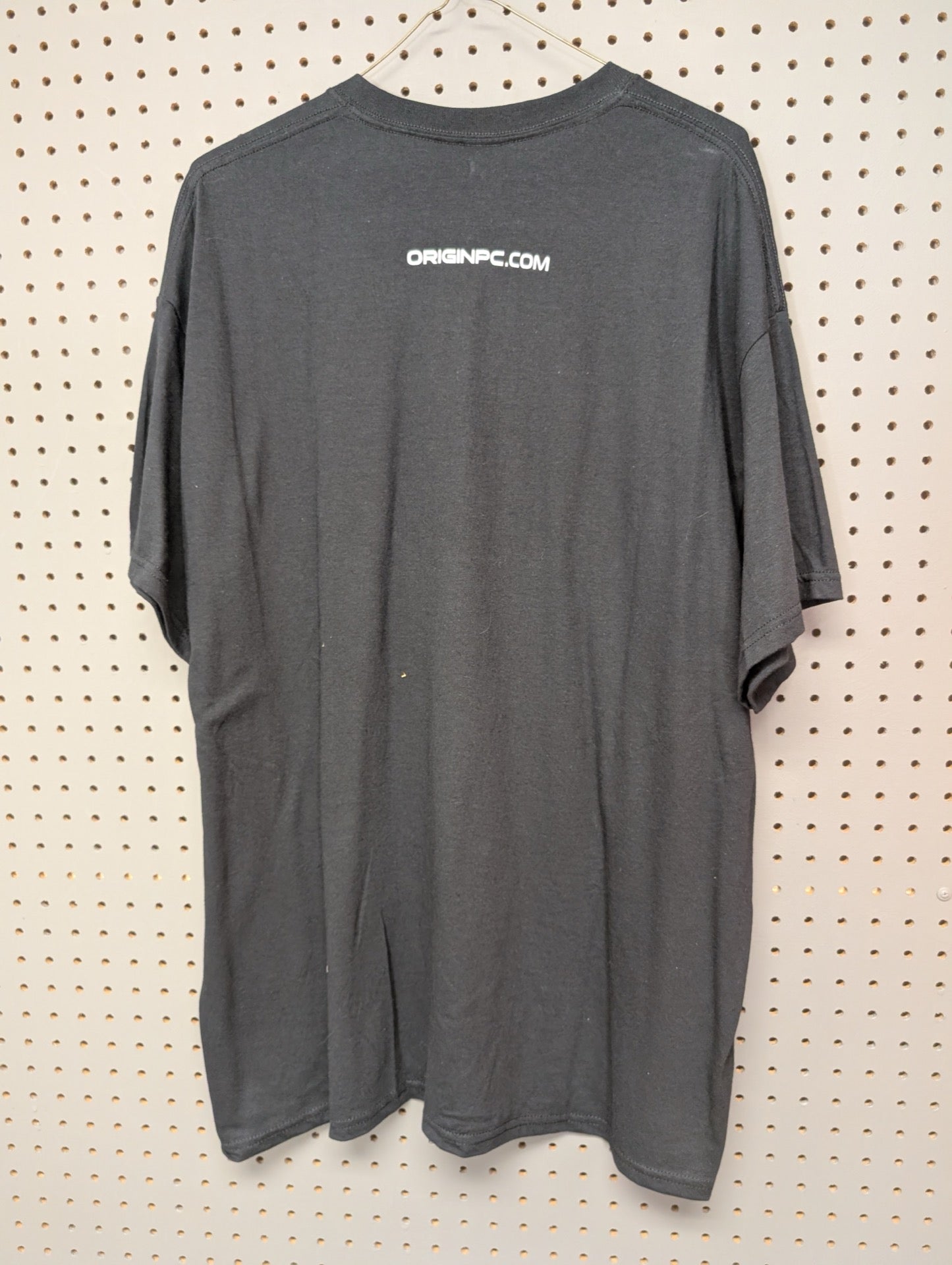 Back view of black Origin PC t-shirt with website logo