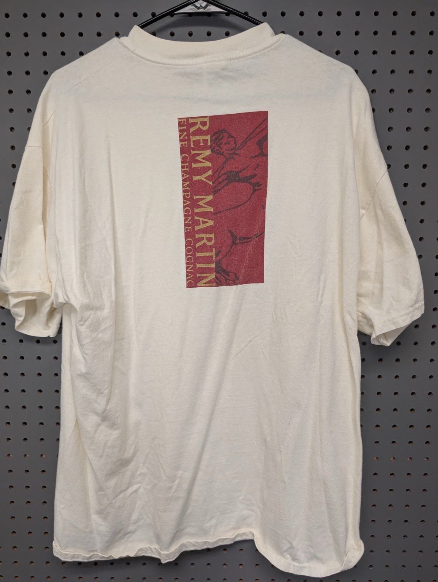 Back view of vintage Remy Martin shirt with red graphic