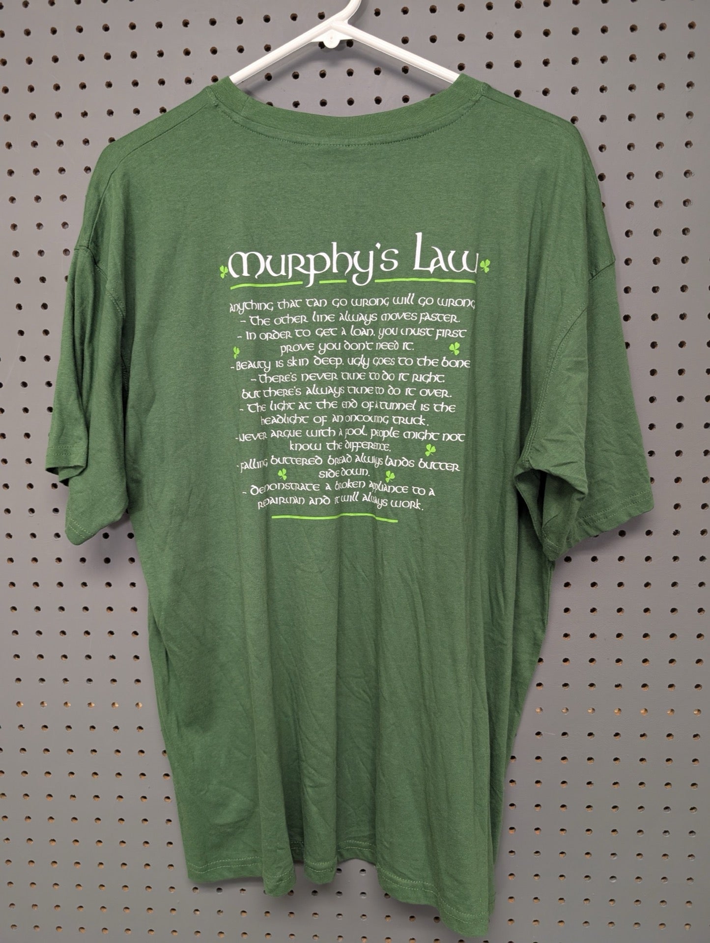 Back view of green t-shirt with Murphy's Law quotes
