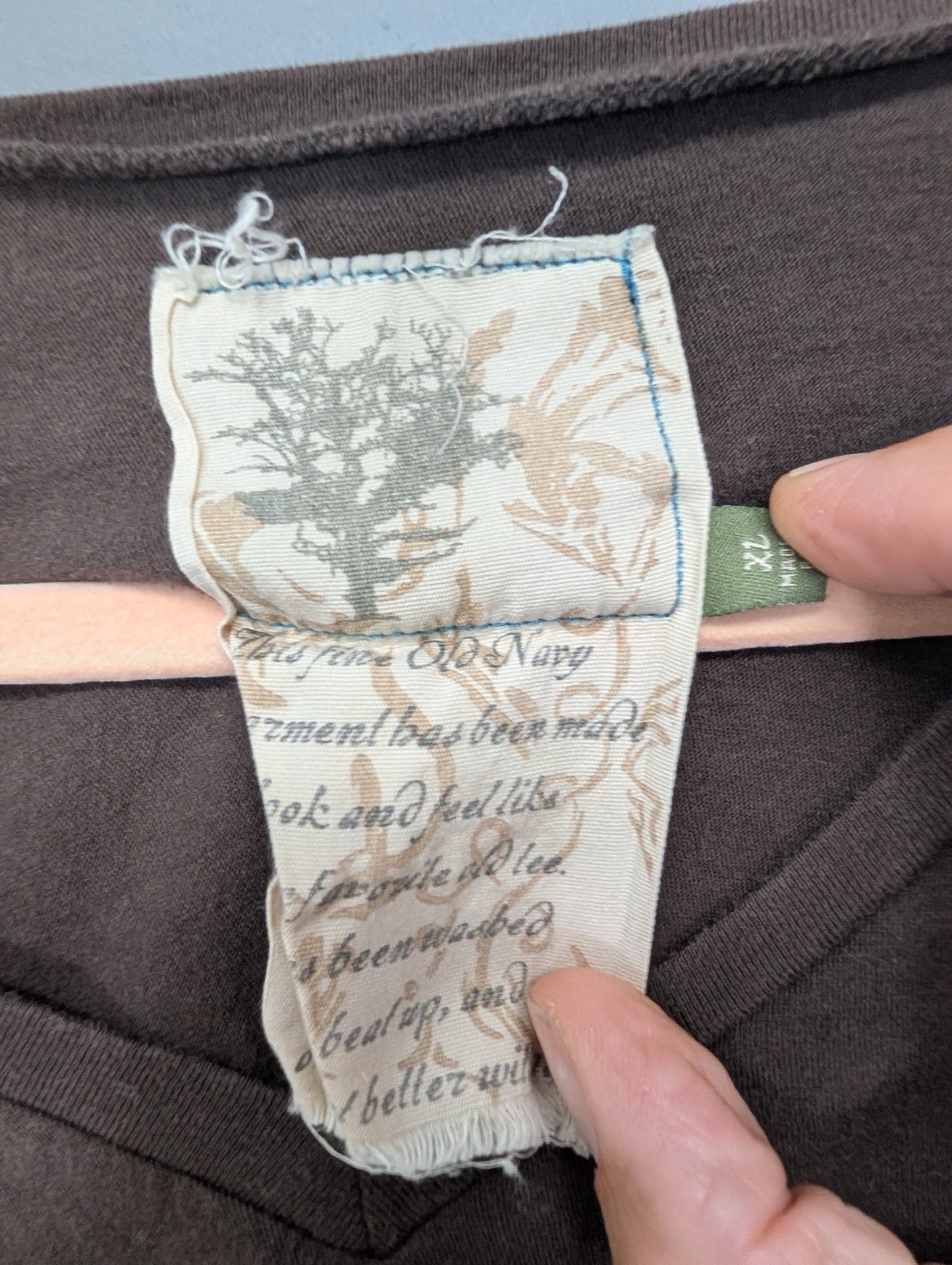 Close up of the intentionally distressed Old Navy collar tag