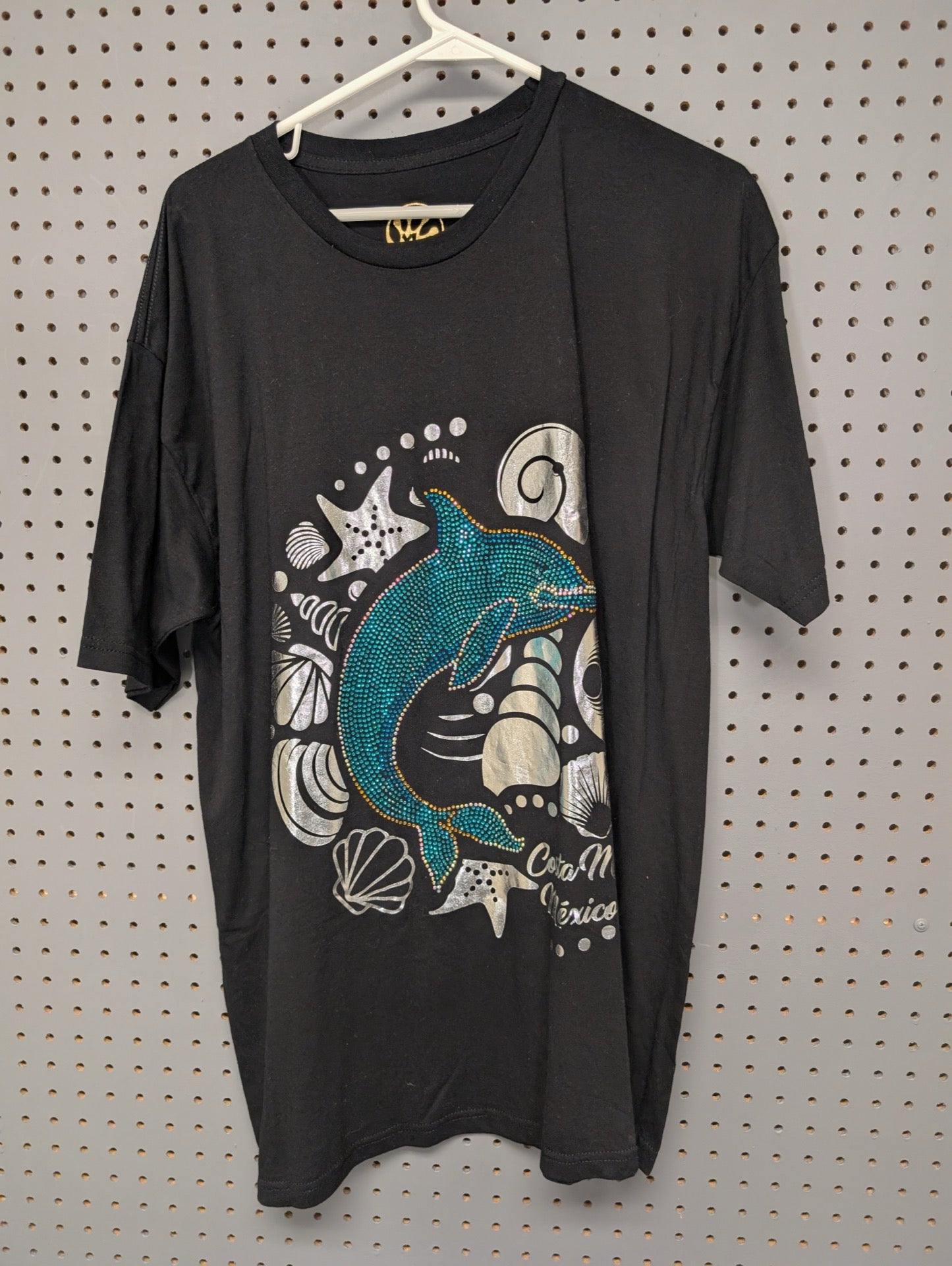 Front of black Costa Maya t-shirt with rhinestone dolphin
