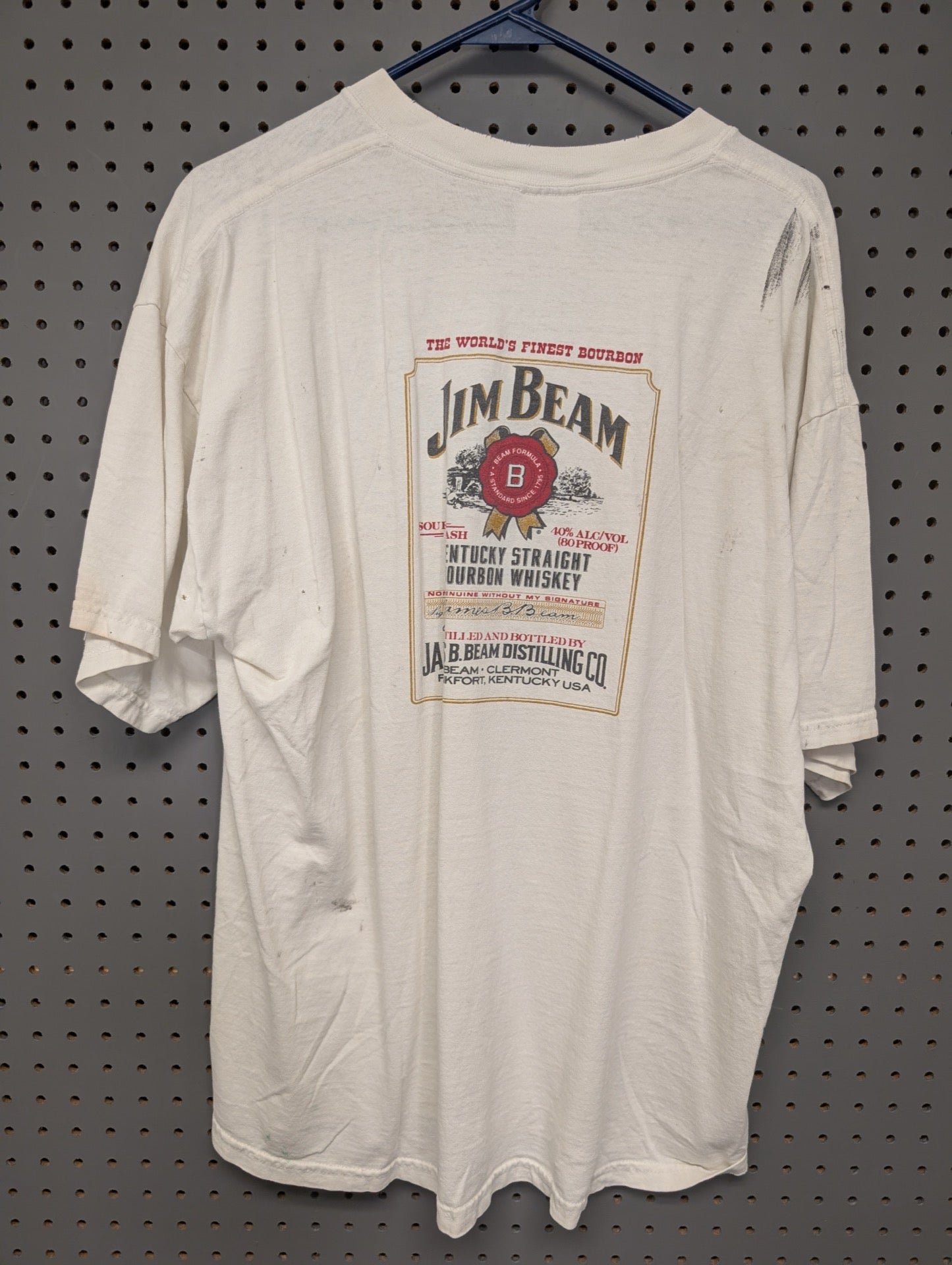 Back of Jim Beam shirt showing label graphic and shoulder stain