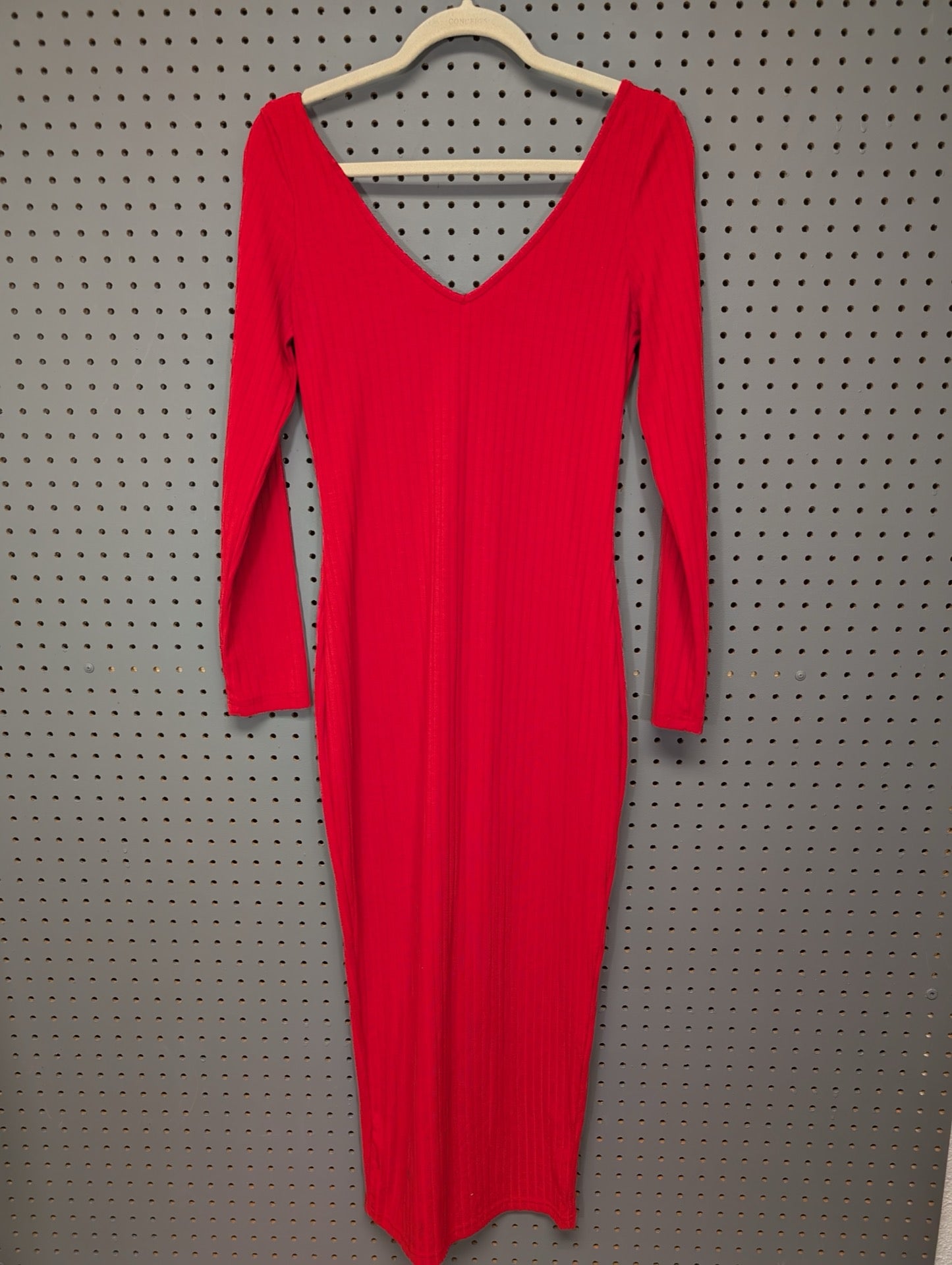 Back view of red long sleeve bodycon dress