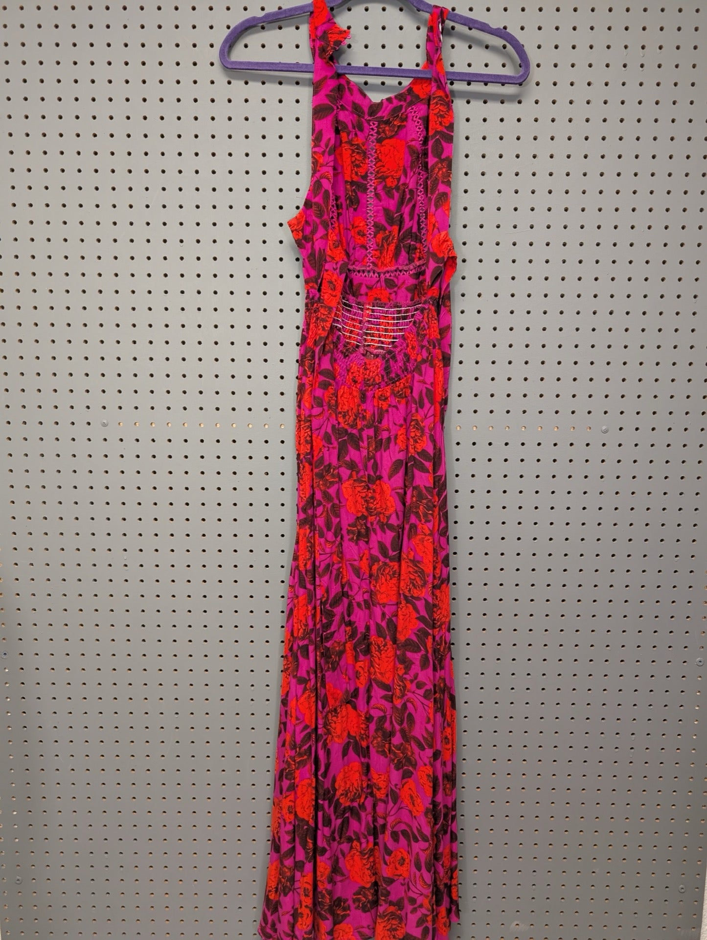 Back view of Abel The Label floral dress showing smocking