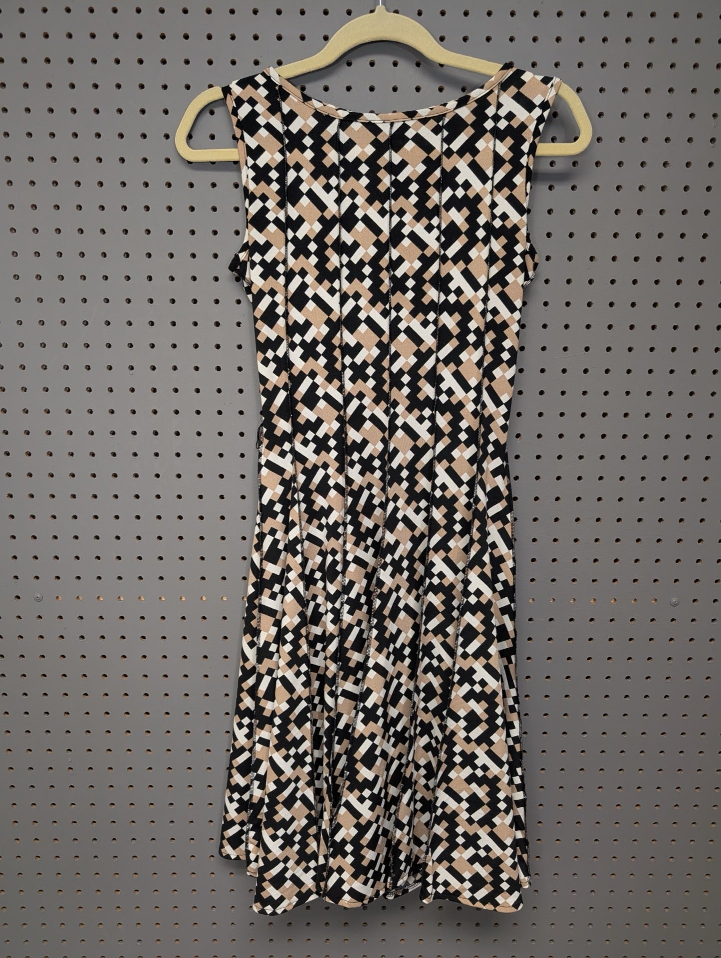 Front view of HAANI Petite geometric fit and flare dress