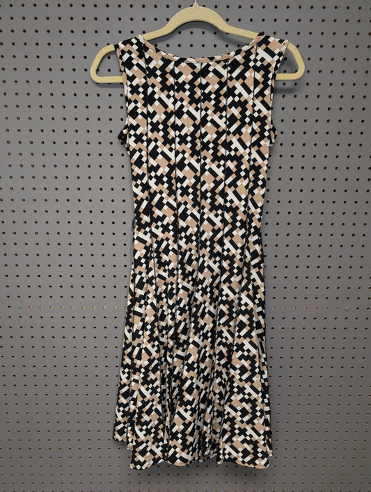 Front view of HAANI Petite geometric fit and flare dress