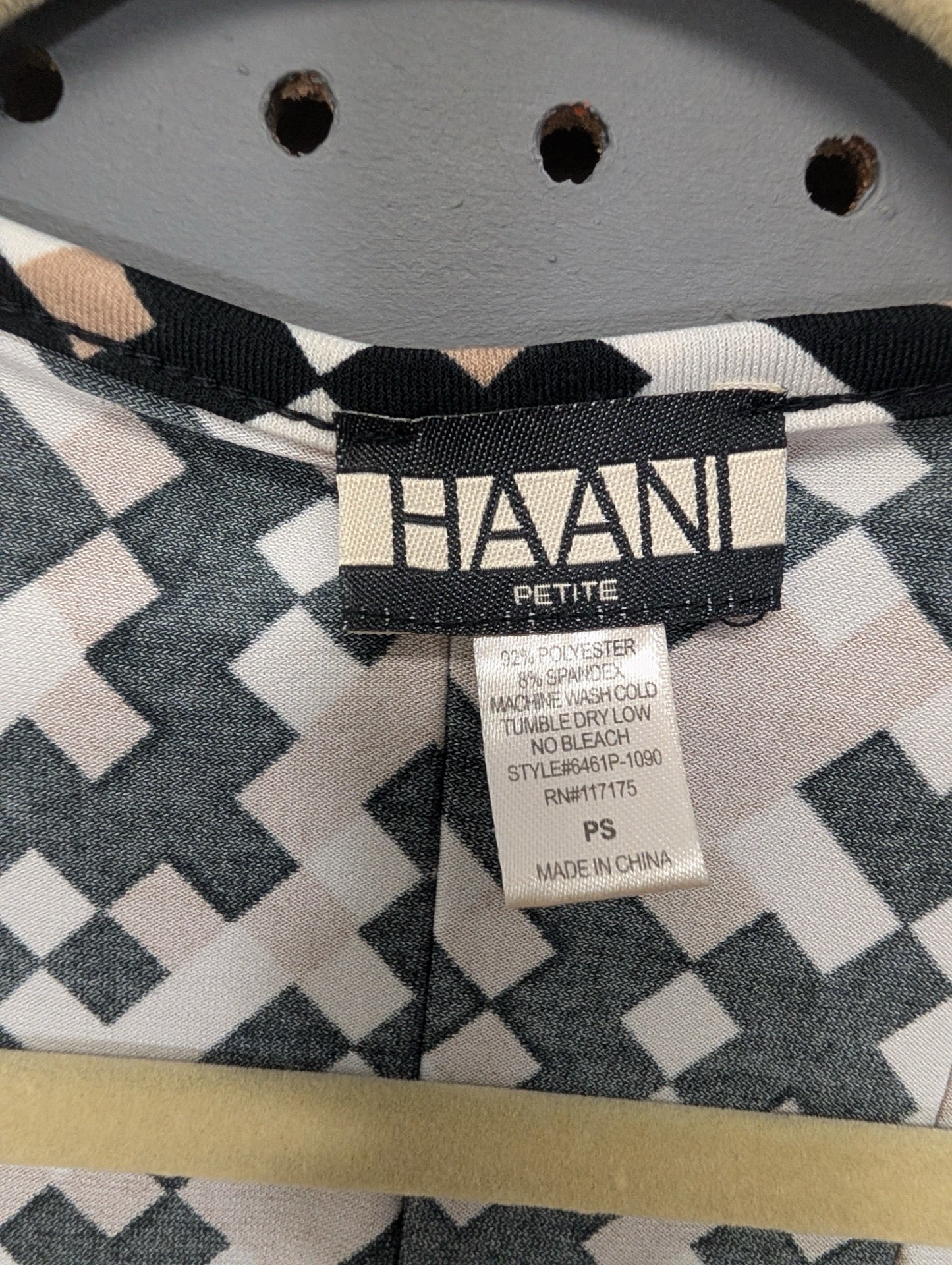 Size tag for HAANI Petite dress PS