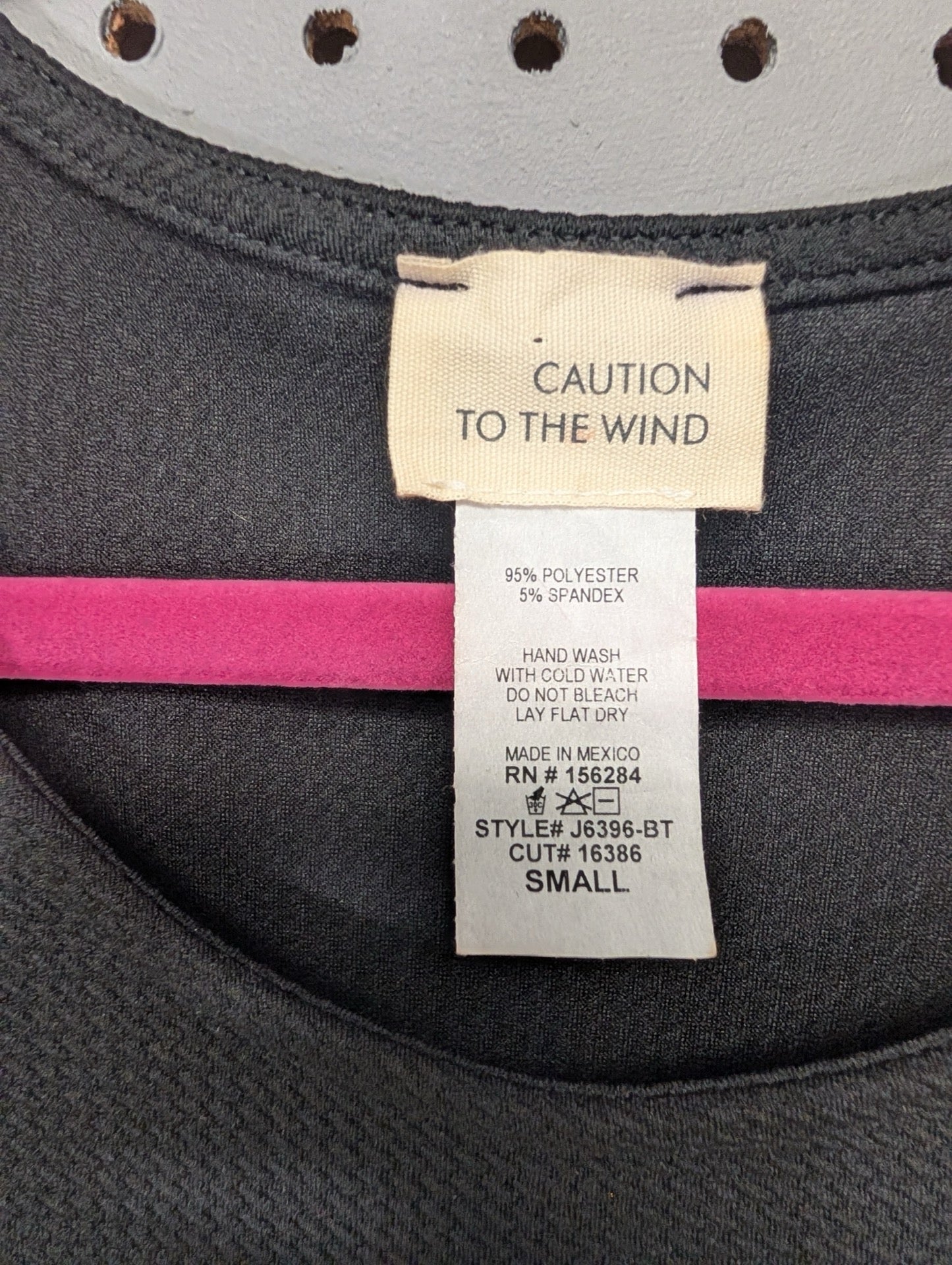 Size tag for Caution To The Wind small