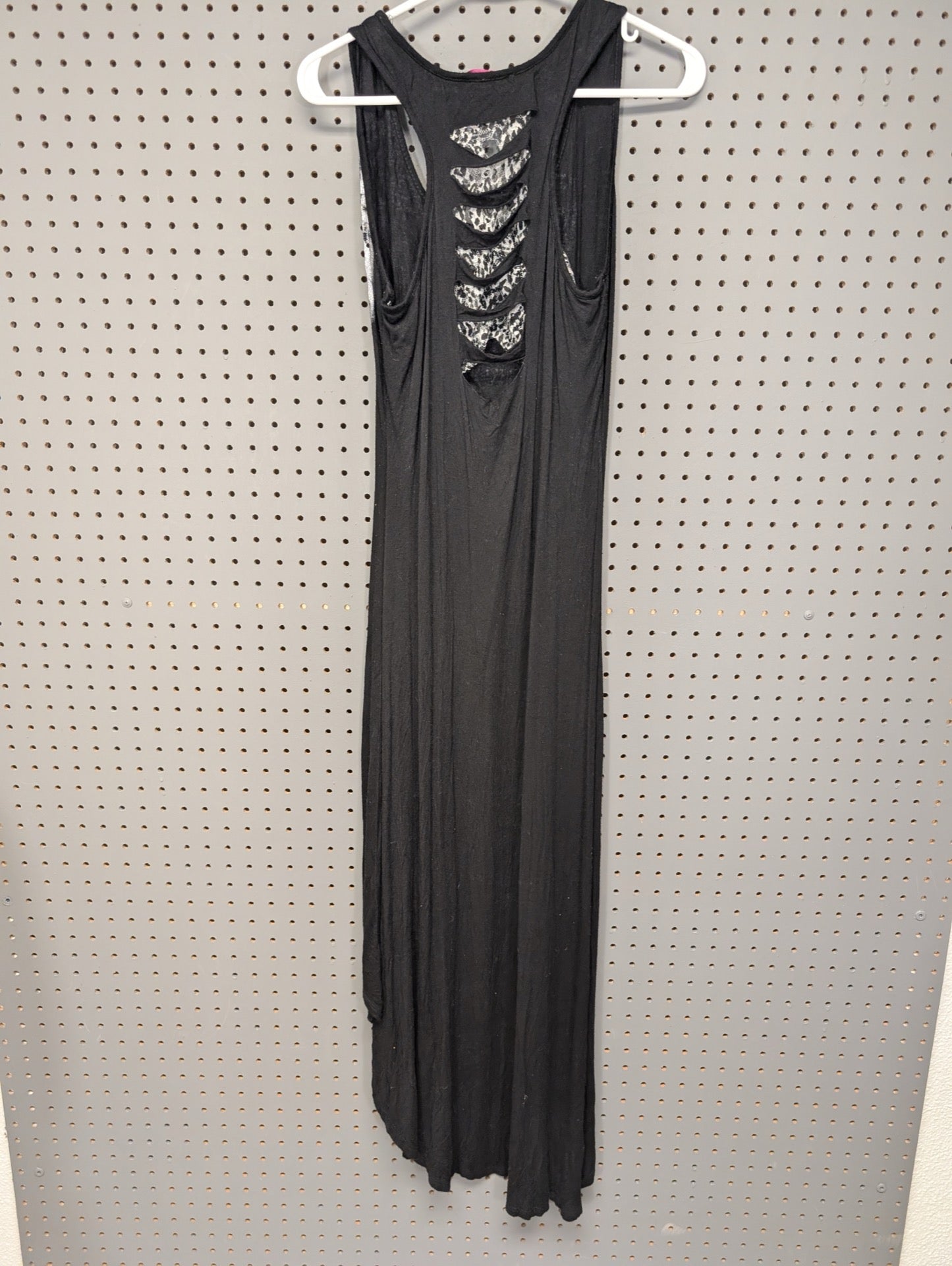 Back view of black dress showing lace cut outs