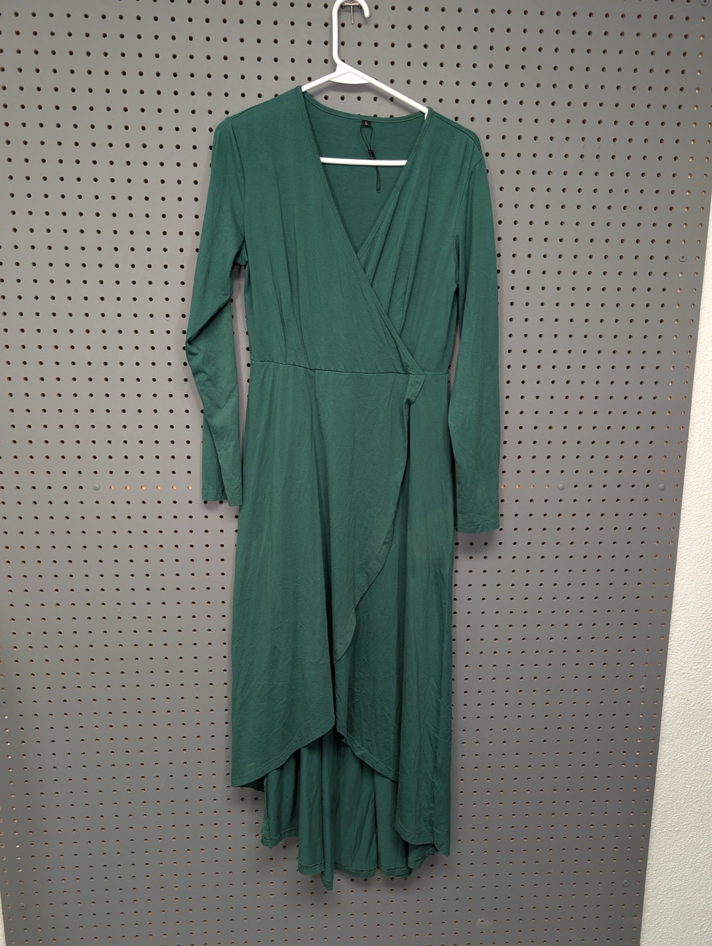 Front view of Ouges green long sleeve wrap dress