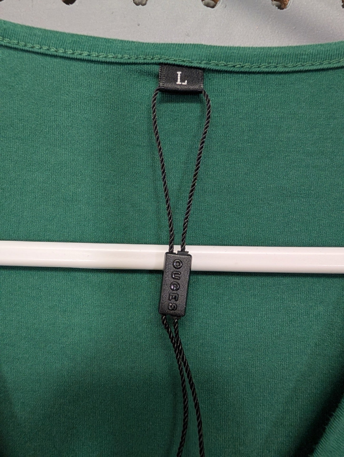 Ouges brand tag indicating new condition