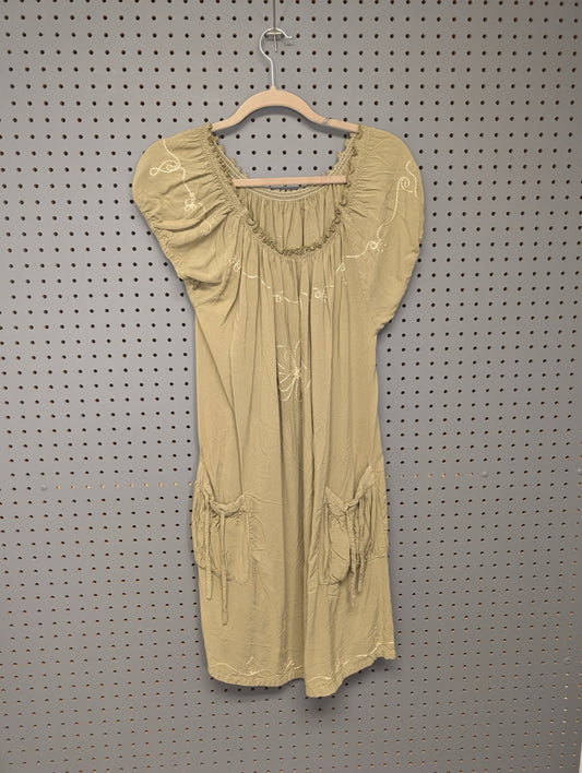 Front view of Island Planet khaki green peasant dress with pockets