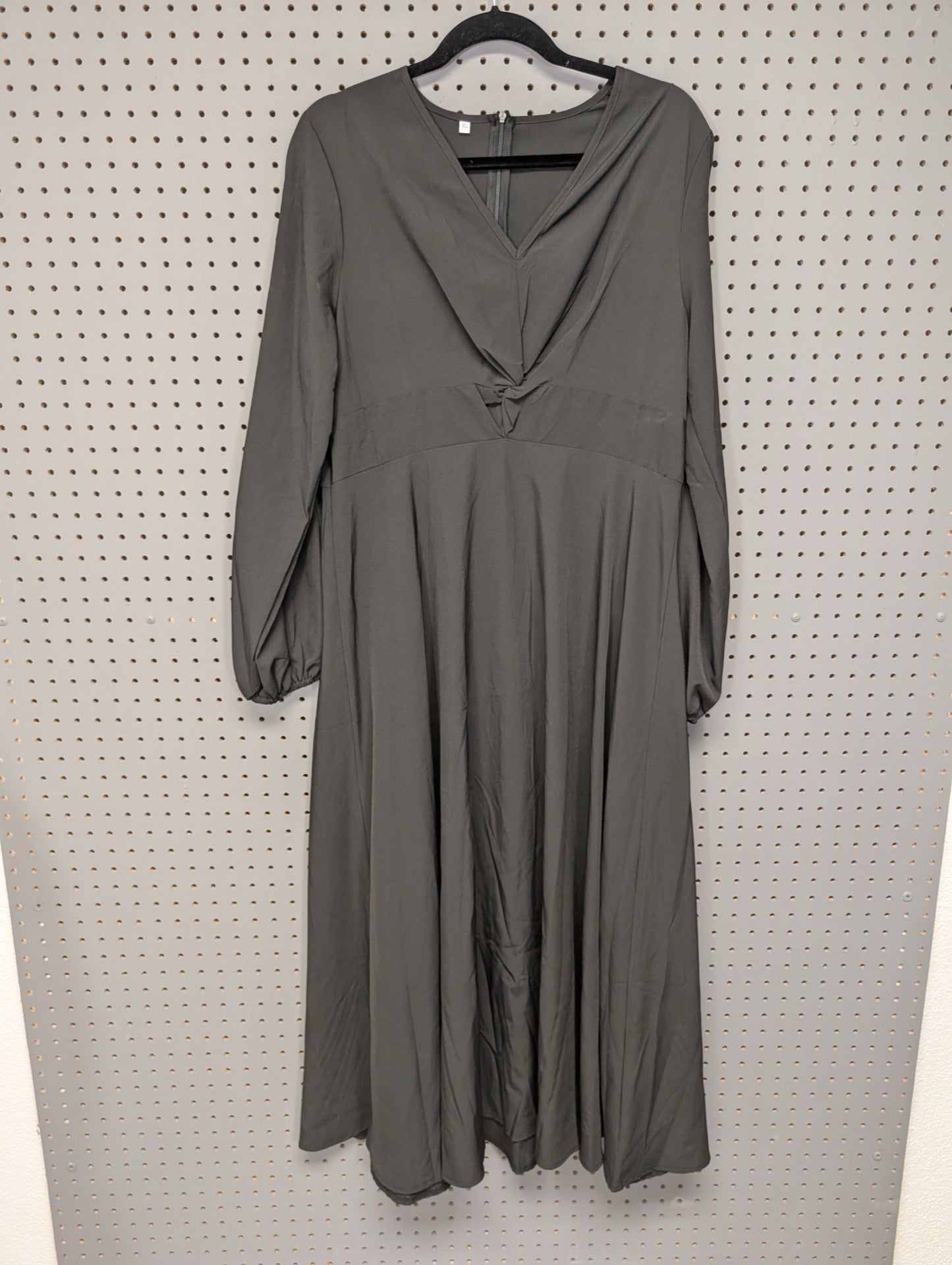 Front view of black long sleeve V-neck dress