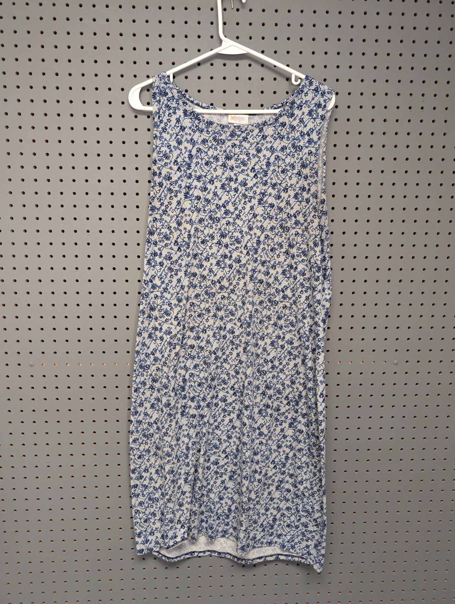 Front view of LuLaRoe blue and white shift dress