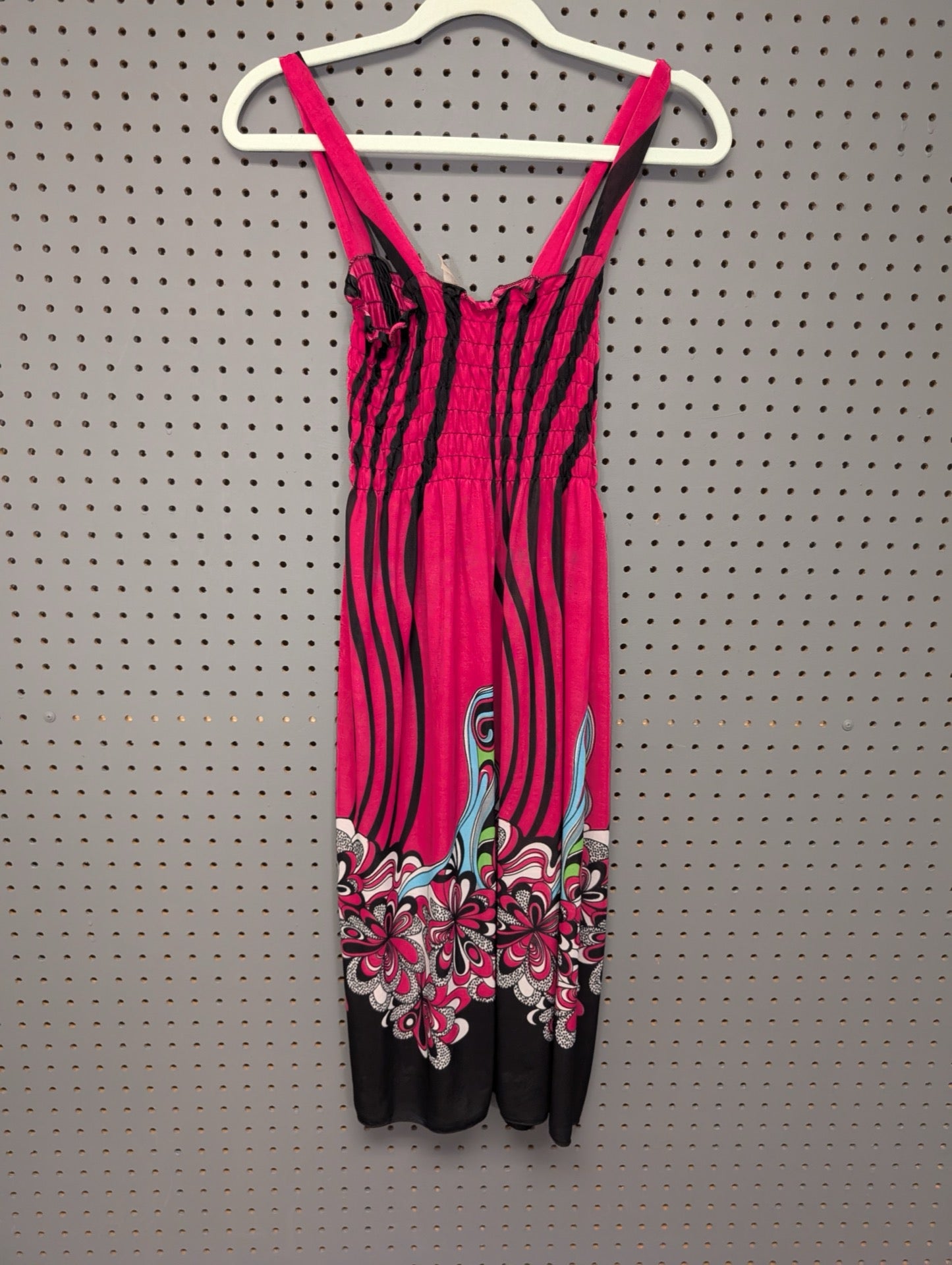 Front view of Ace Fashion pink smocked dress