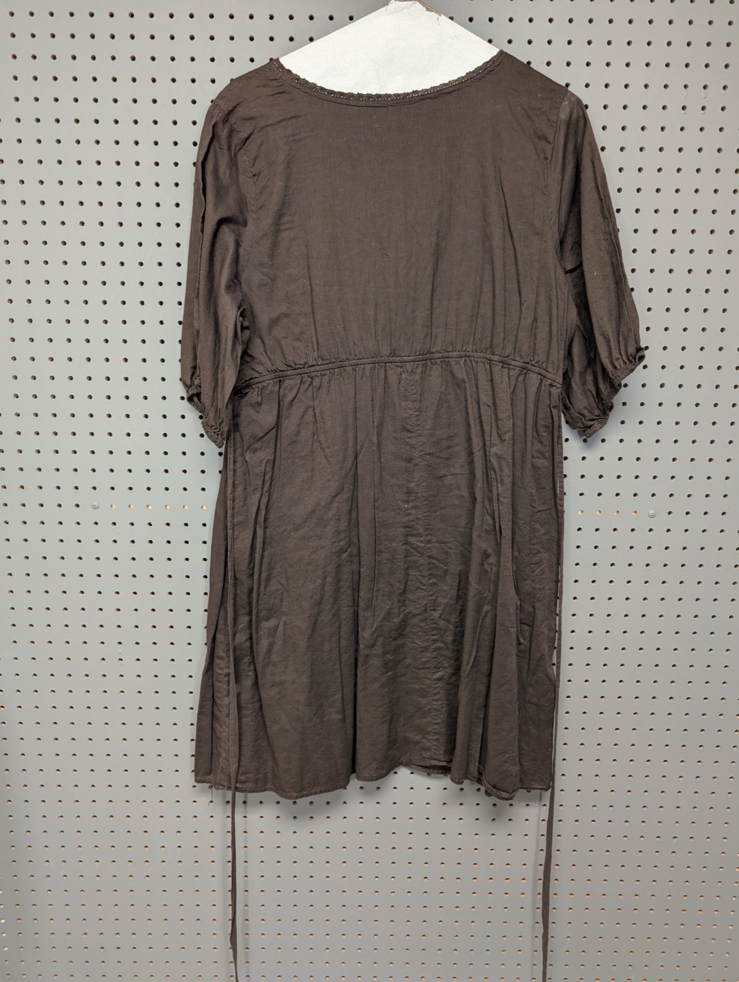 Back view of Old Navy brown dress showing ties