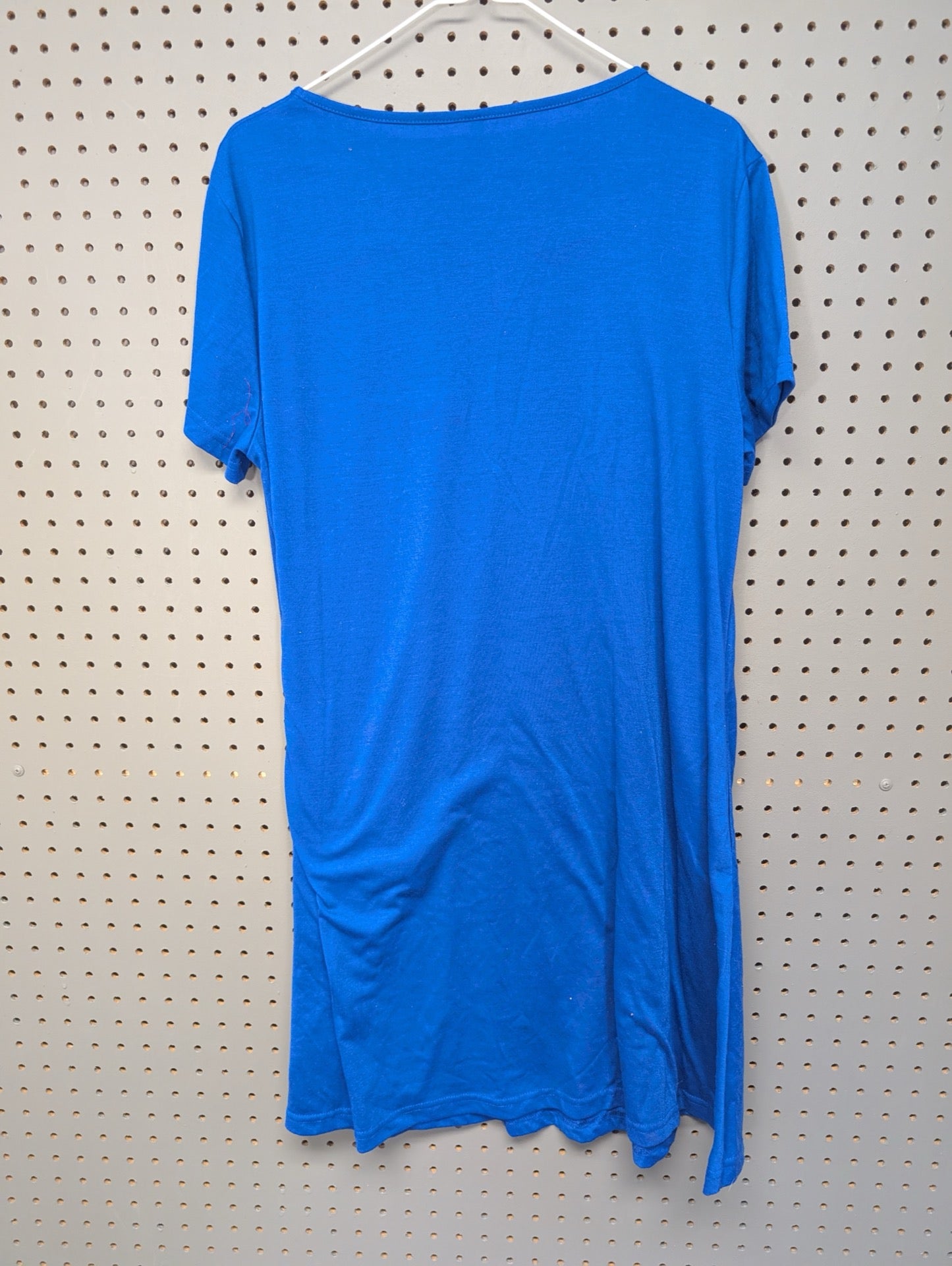 Back view of bright blue dress