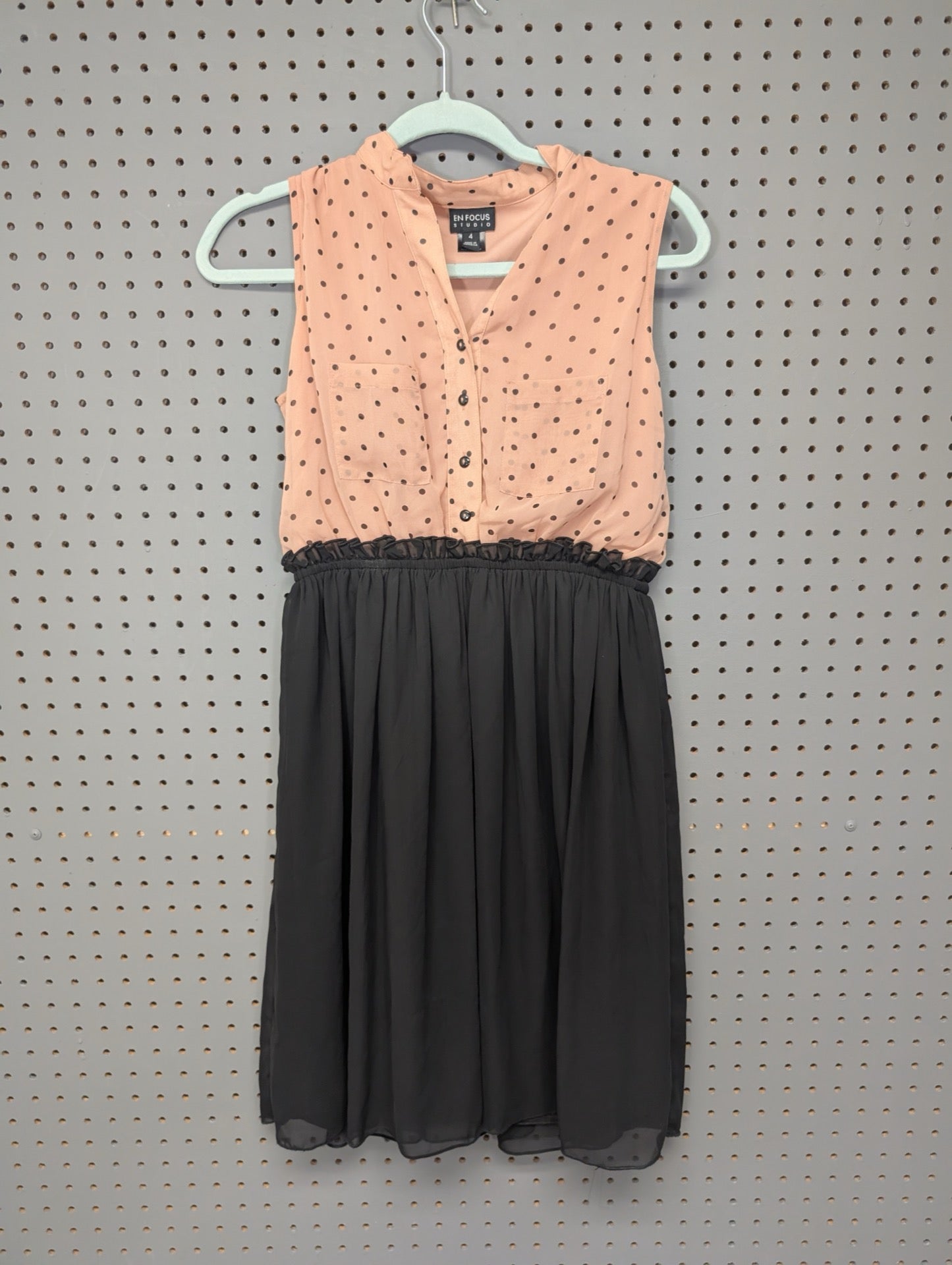 Front view of En Focus Studio polka dot dress