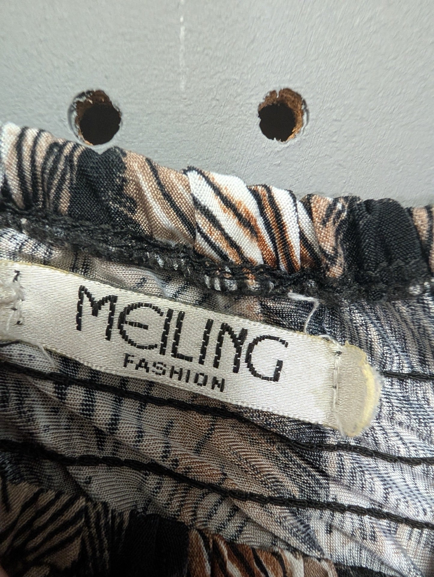 Tag view of Meiling Fashion peacock dress