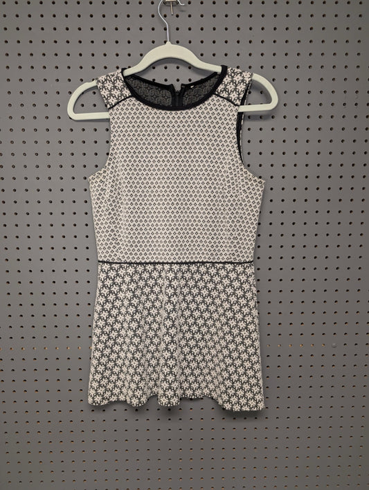 Front view of unbranded geometric peplum dress