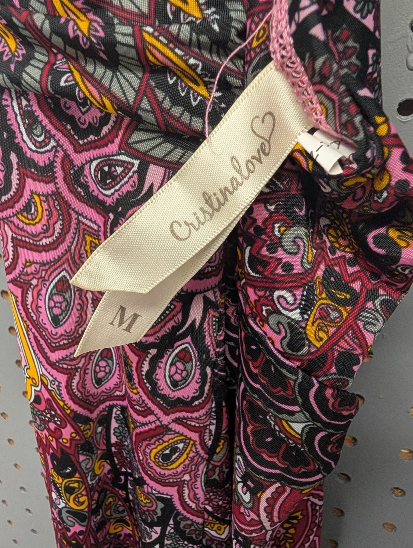 Brand tag showing Cristinalove Size M