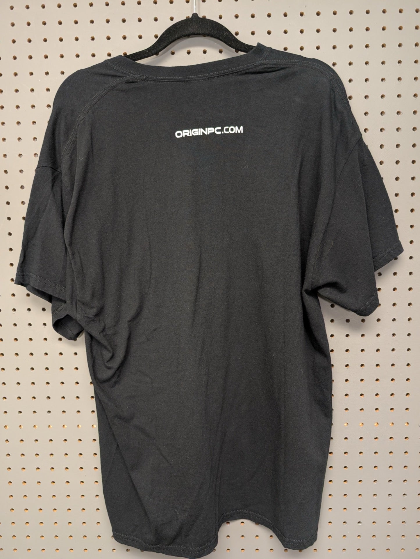 Back of black ORIGIN PC t-shirt with website URL