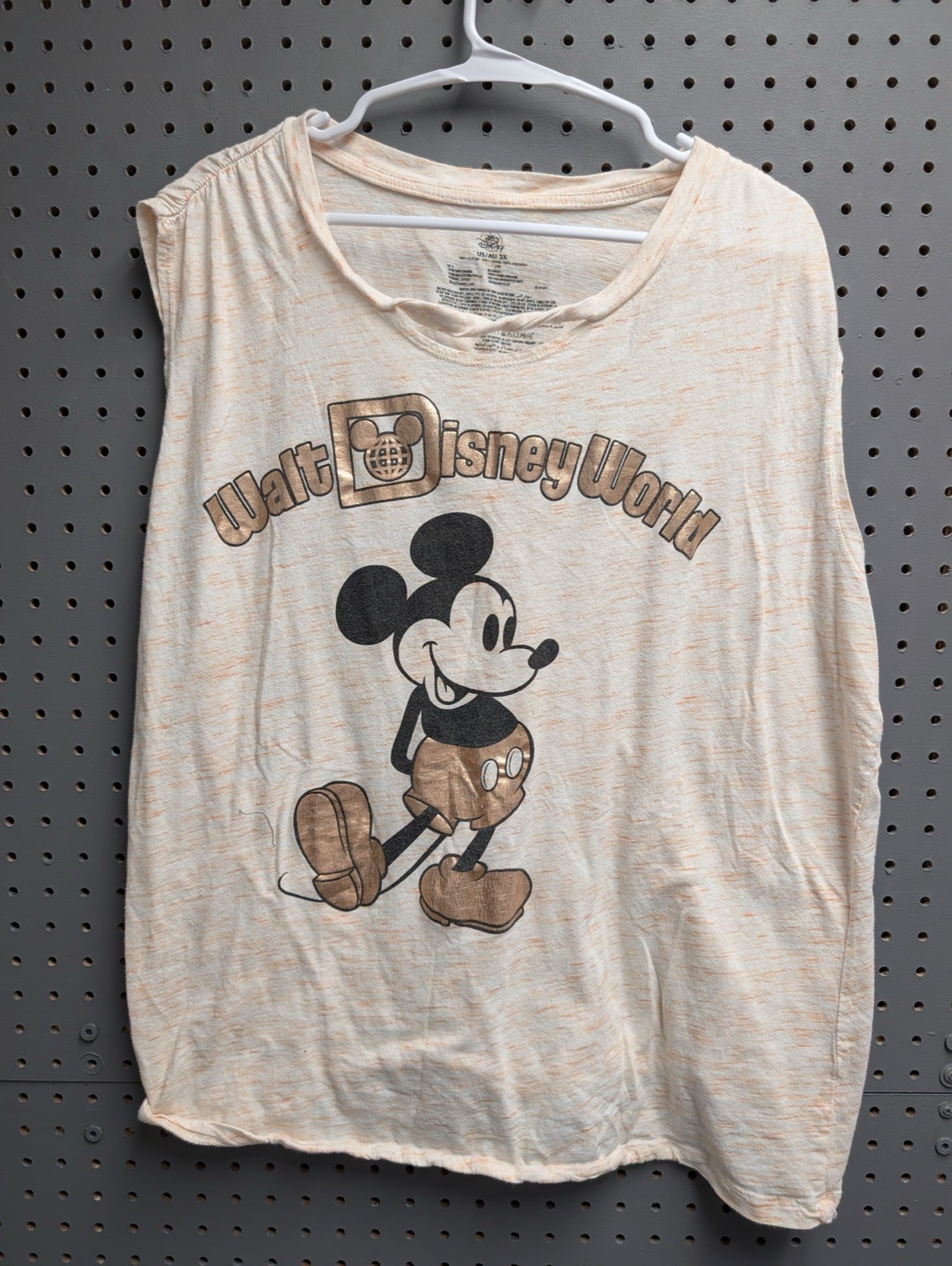 Front view of cream tank top with gold metallic Mickey Mouse graphic