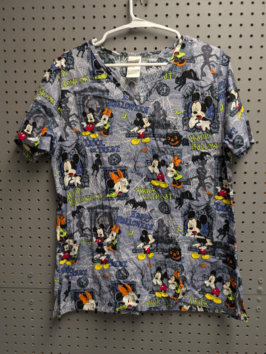 Front view of blue Halloween Mickey Mouse scrub top
