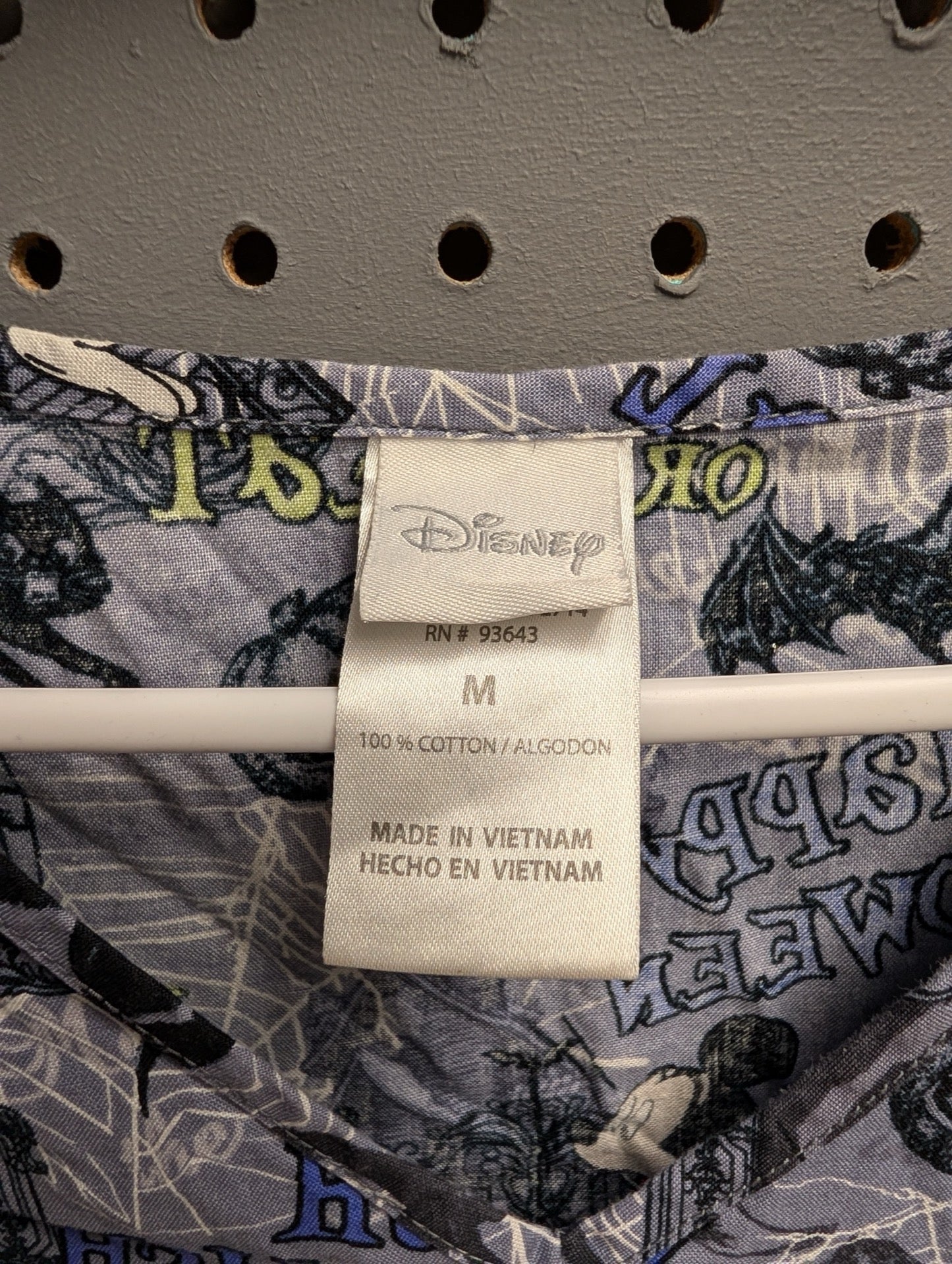 Close up of Disney size Medium tag