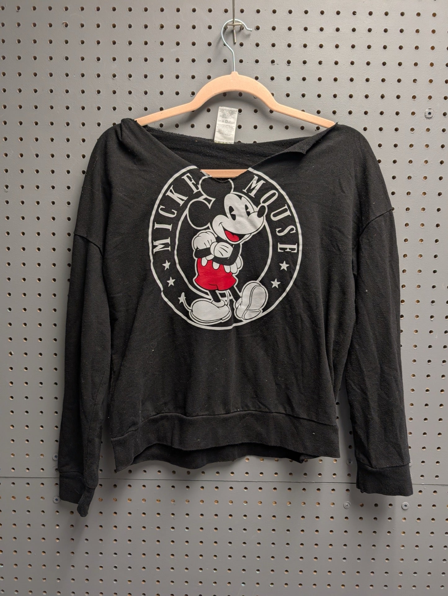 Front view of black Mickey Mouse raw hem hoodie
