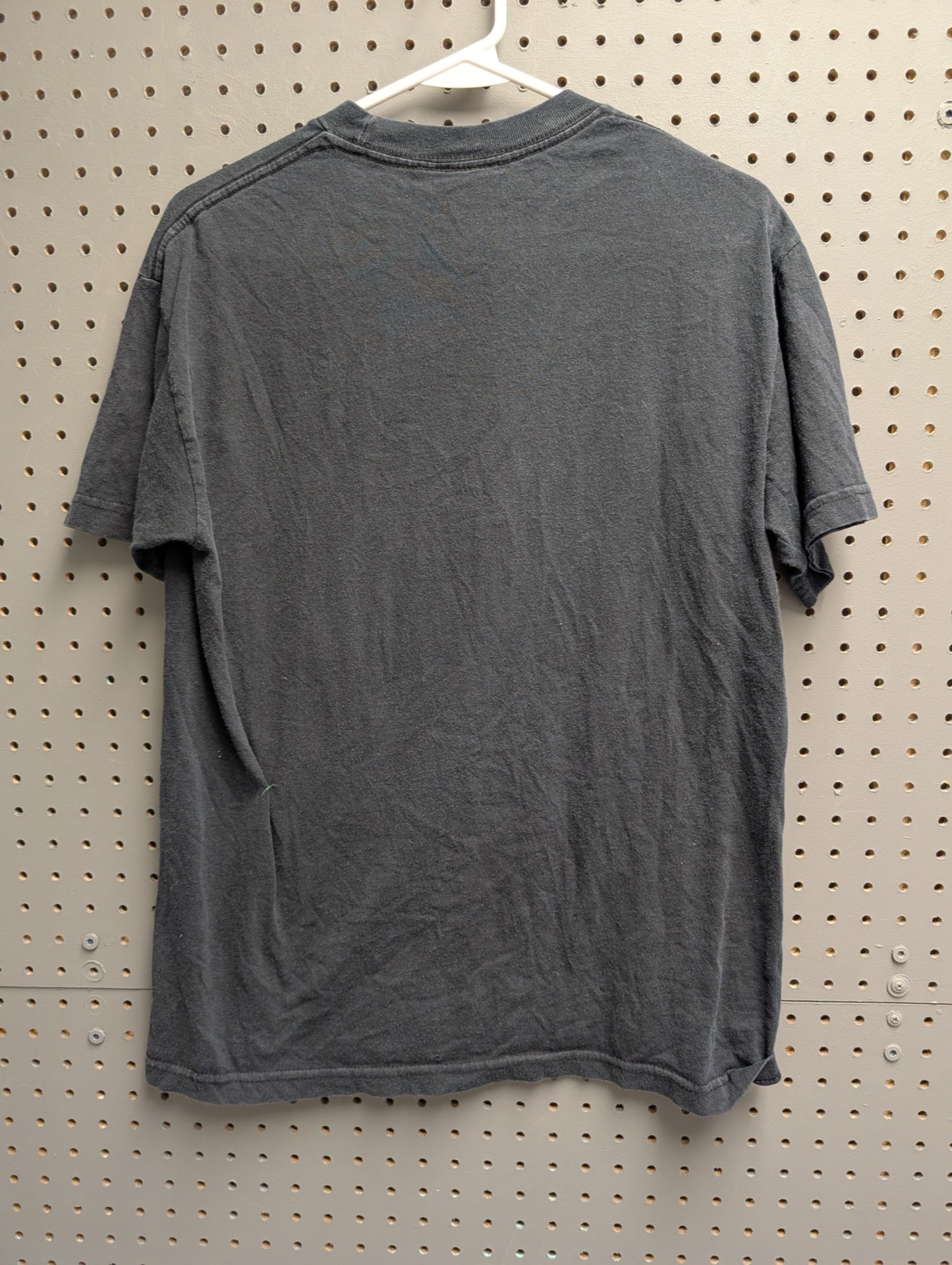 Back view of faded black t-shirt
