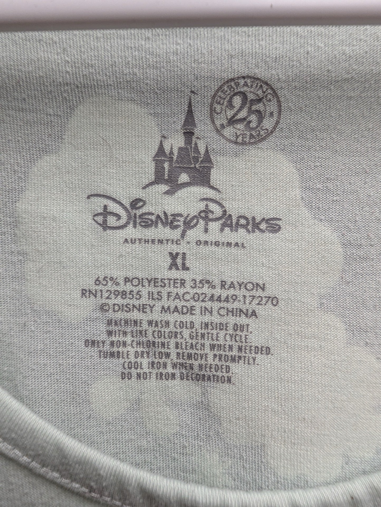 Close up of Disney Parks Authentic Original tag size XL