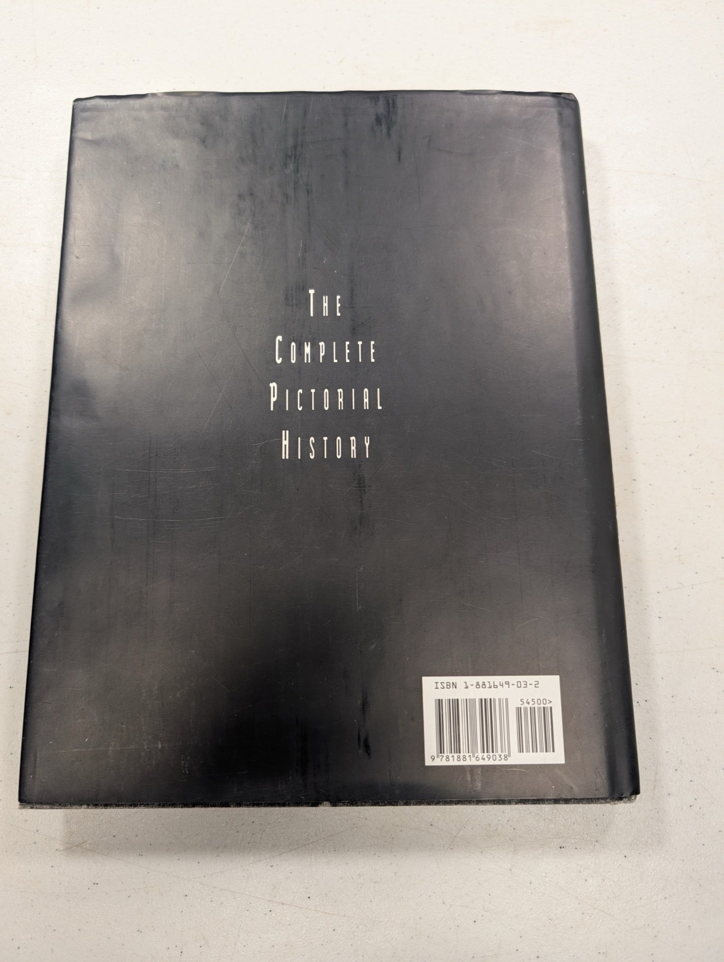 Back cover showing the complete pictorial history text