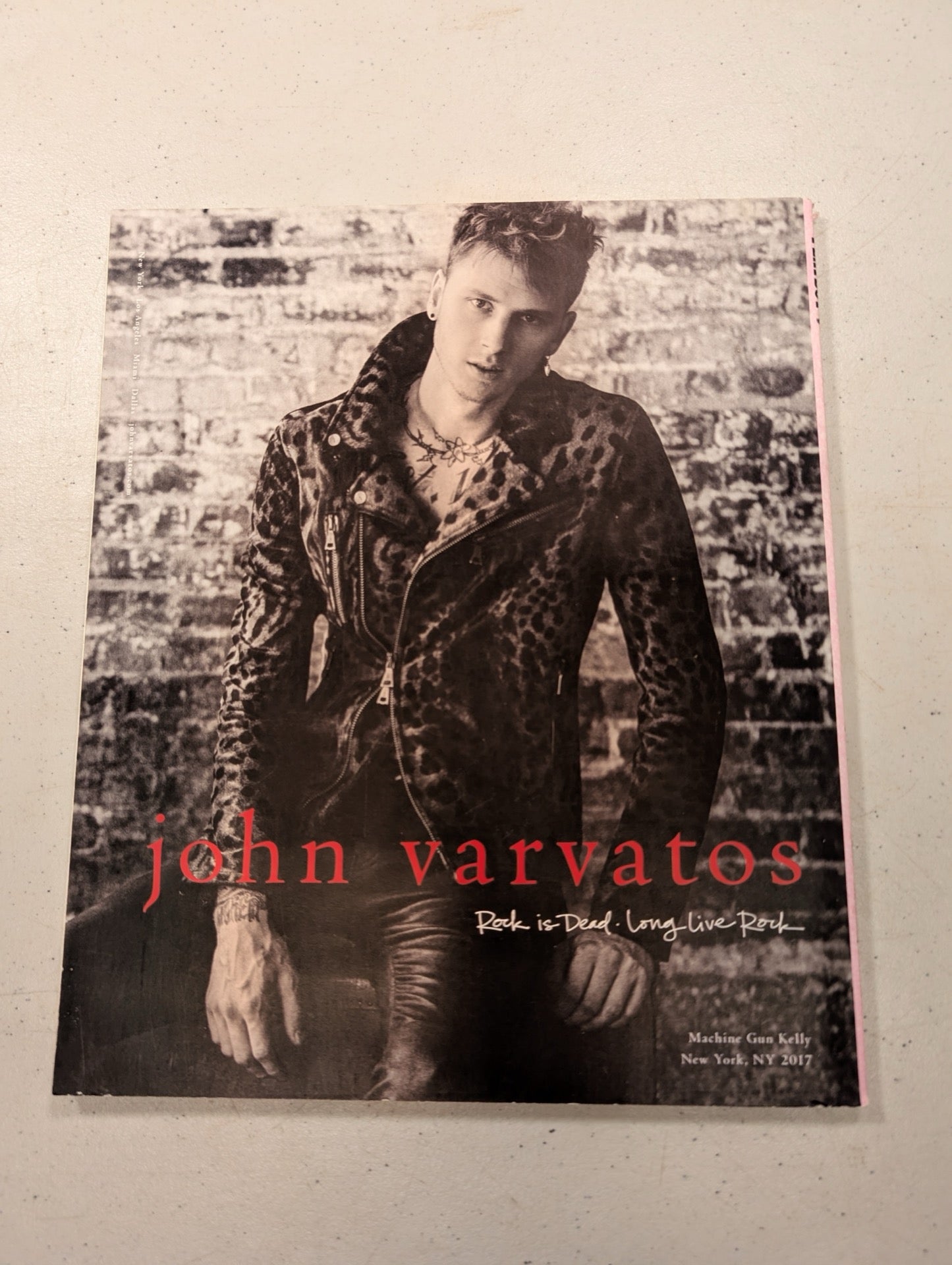 Back cover featuring John Varvatos ad