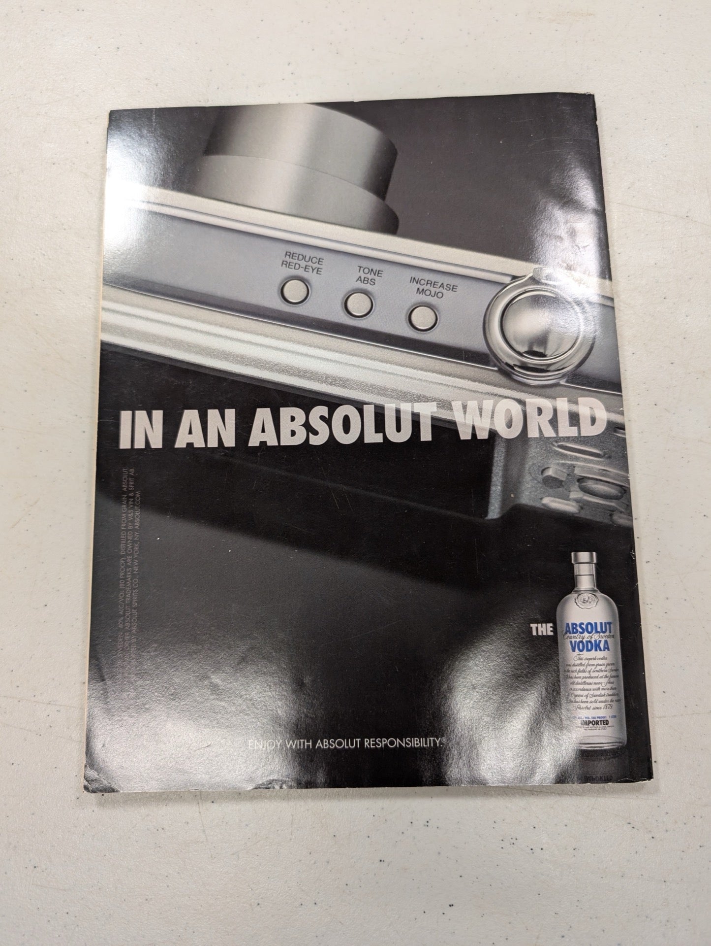Back cover featuring Absolut Vodka ad