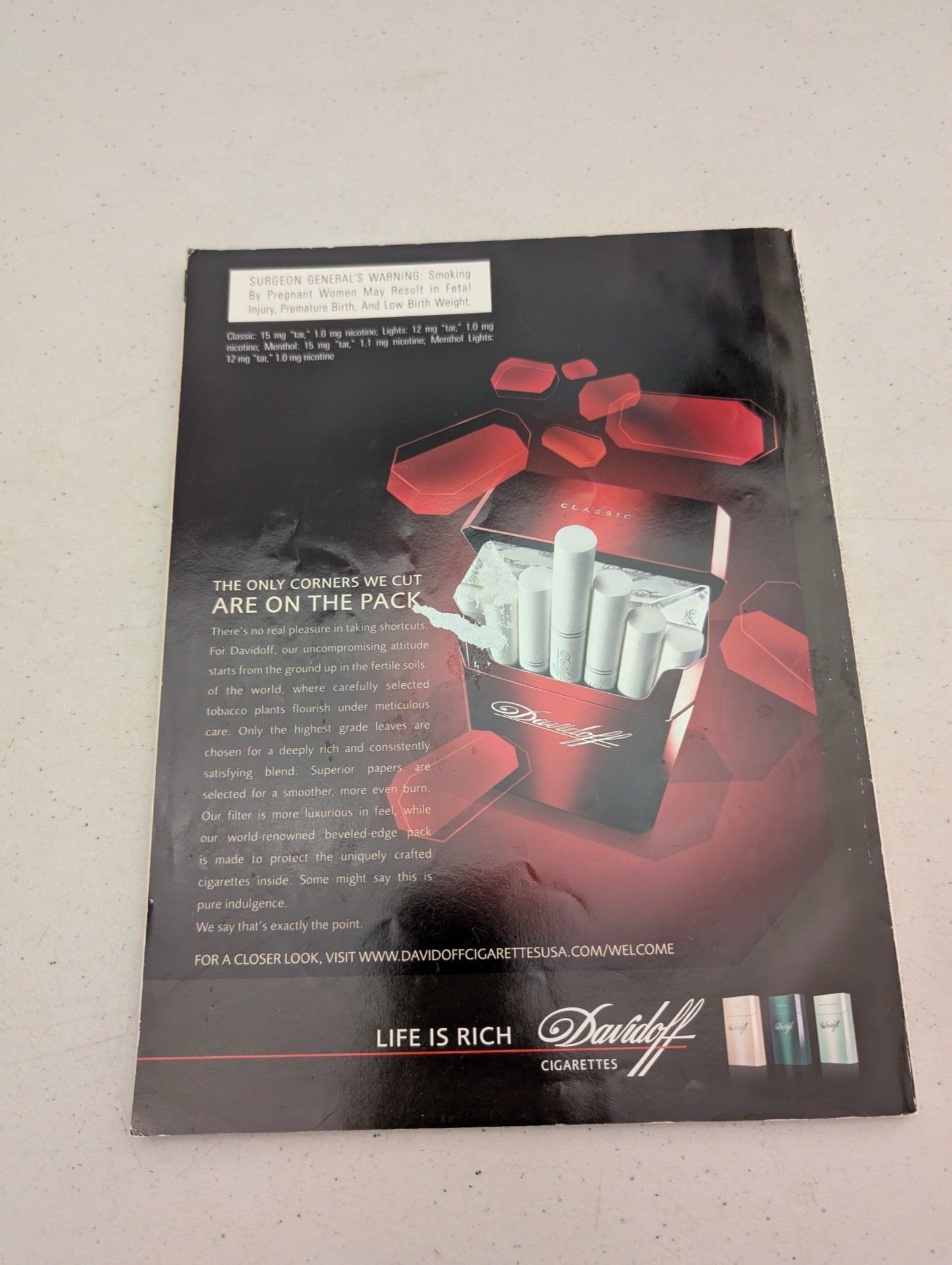 Back cover of Playboy Magazine August 2008 Davidoff ad tear