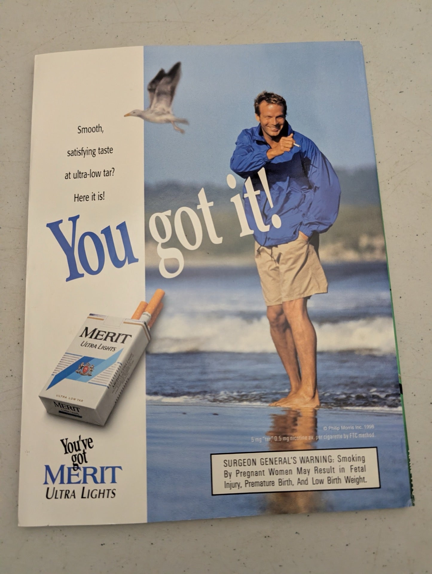 Back cover featuring Merit Ultra Lights ad