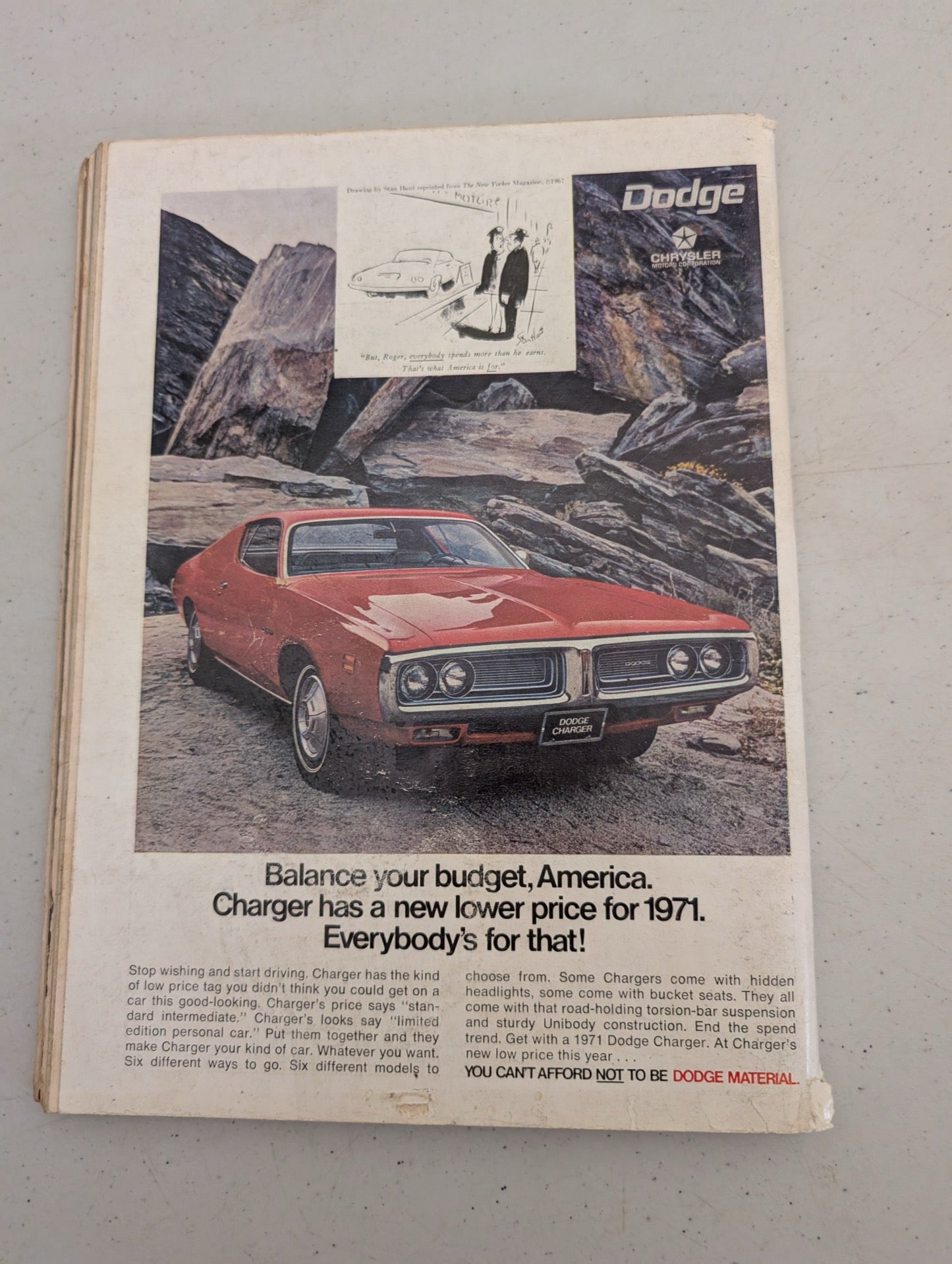 Back cover of vintage 1970 Playboy featuring a Dodge Charger ad